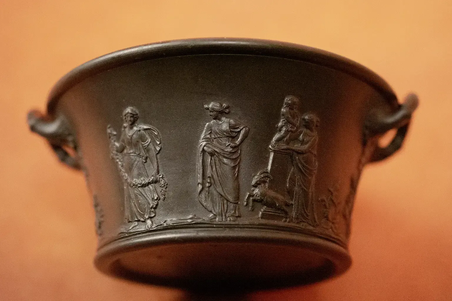 A Brown Ceramic Bowl With Handles From Wedgwood, Decorated With Antique Friezes photo furniture