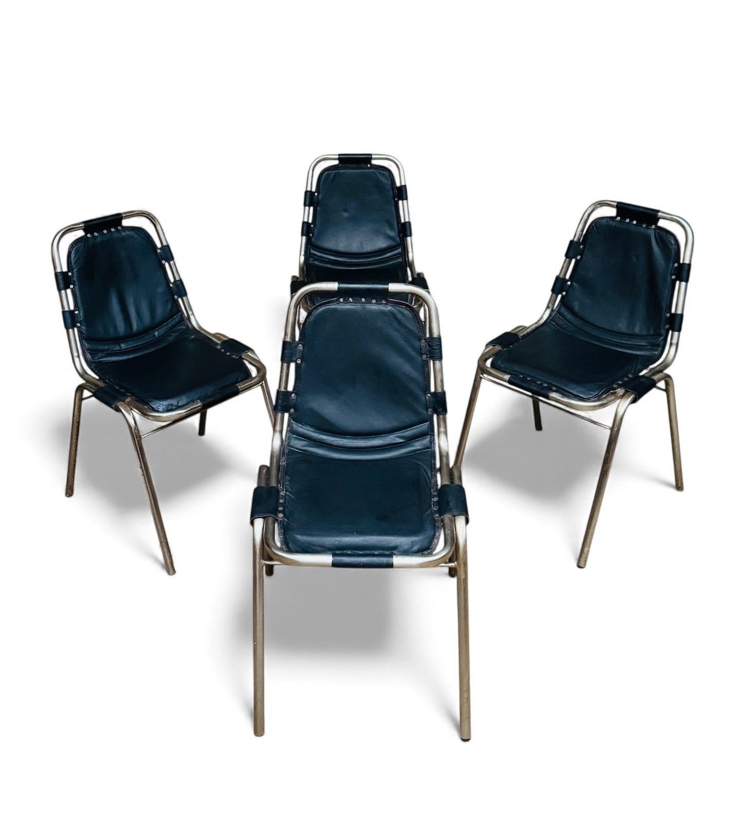 Set Of Four Les Arcs Steel And Leather Dining Chairs Charlotte Perriand Style