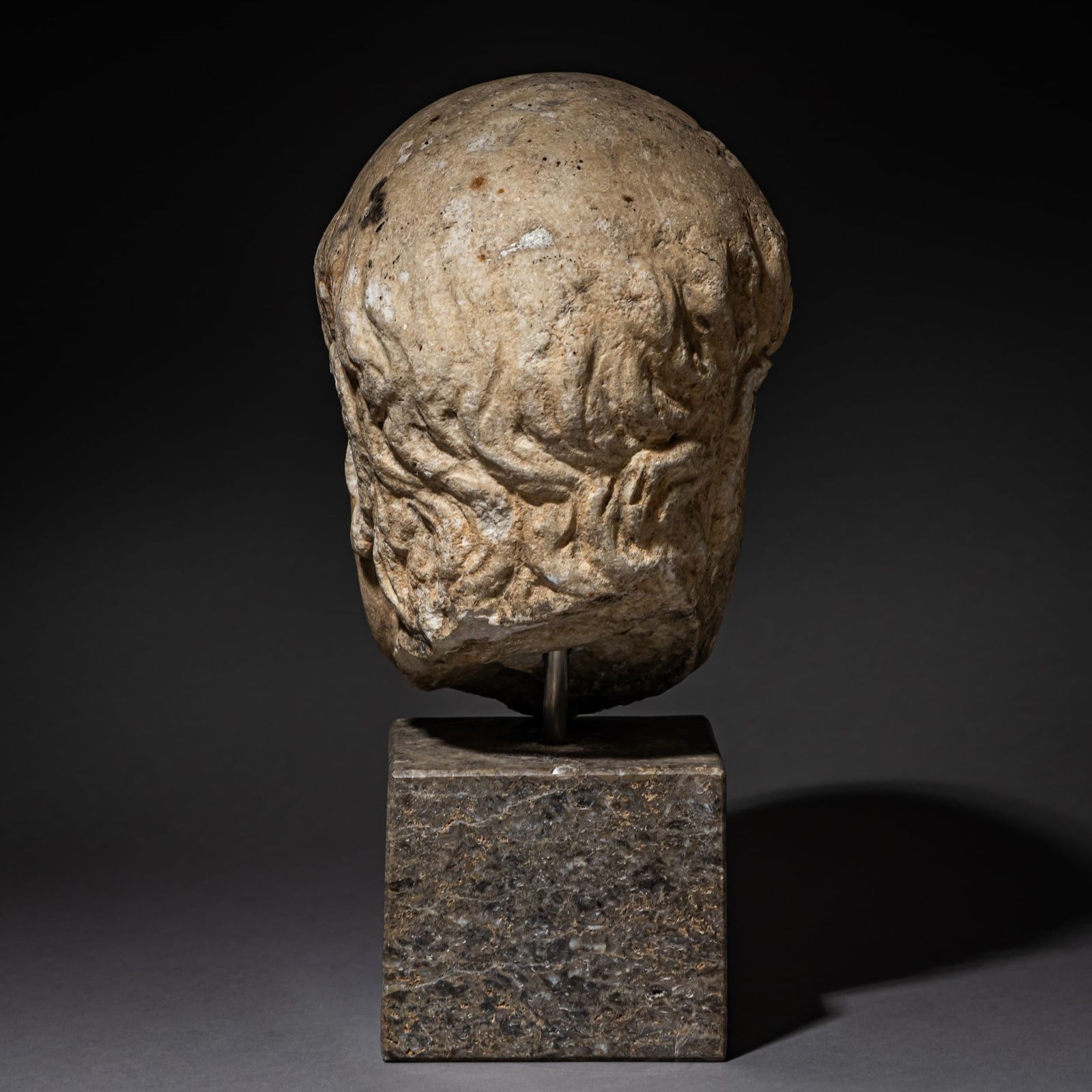 Marble Head Of An Elderly Man, Likely Roman photo vinterior