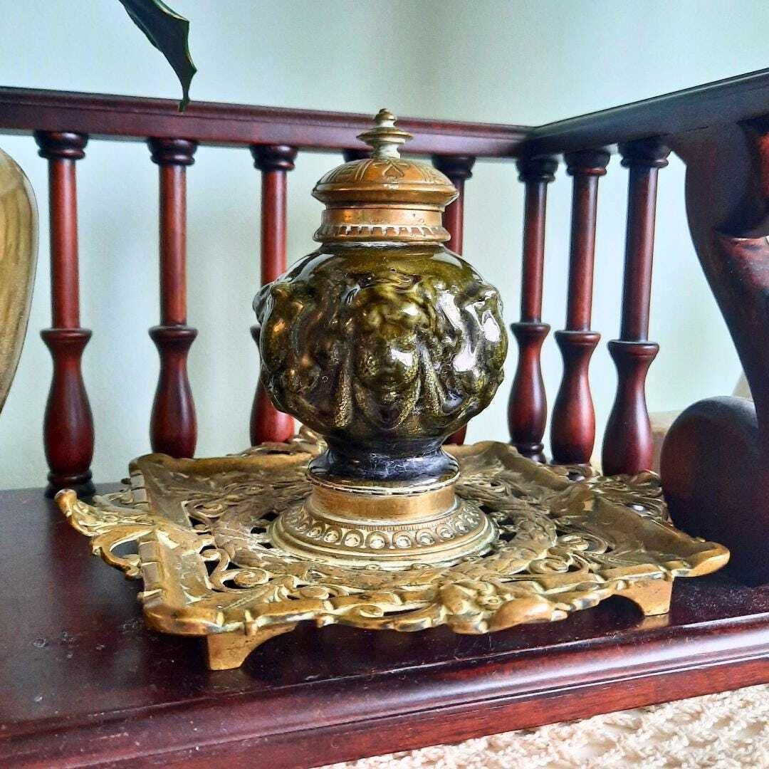 Antique Brass Linthorpe Pottery Inkwell With Cherub Faces And Ornate Decoration Made In 1905