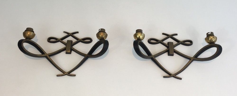 In The Style Of Jules Leleu. Pair Of Black Lacquered And Brass Design Wall Sconces. Circa 1950 photo furniture