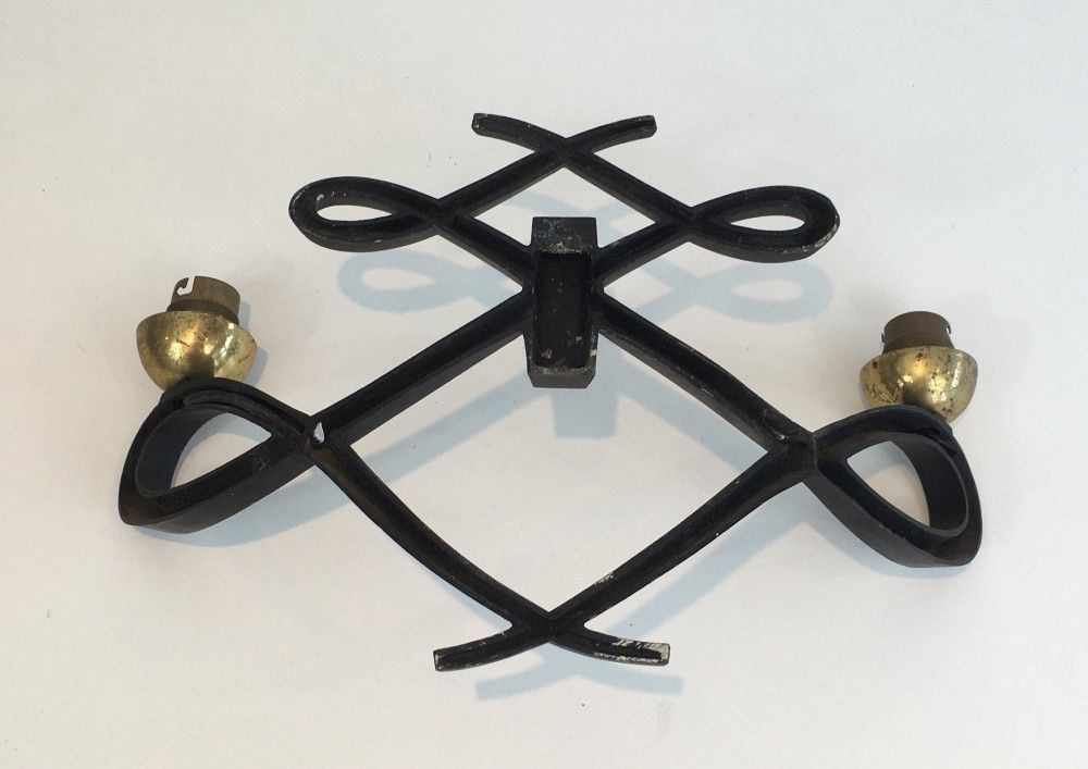 In The Style Of Jules Leleu. Pair Of Black Lacquered And Brass Design Wall Sconces. Circa 1950 photo buy