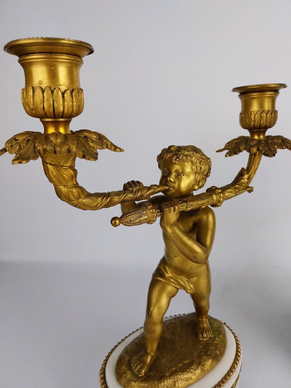 Pair Of Gilt Bronze Cherub Candlesticks photo vinterior