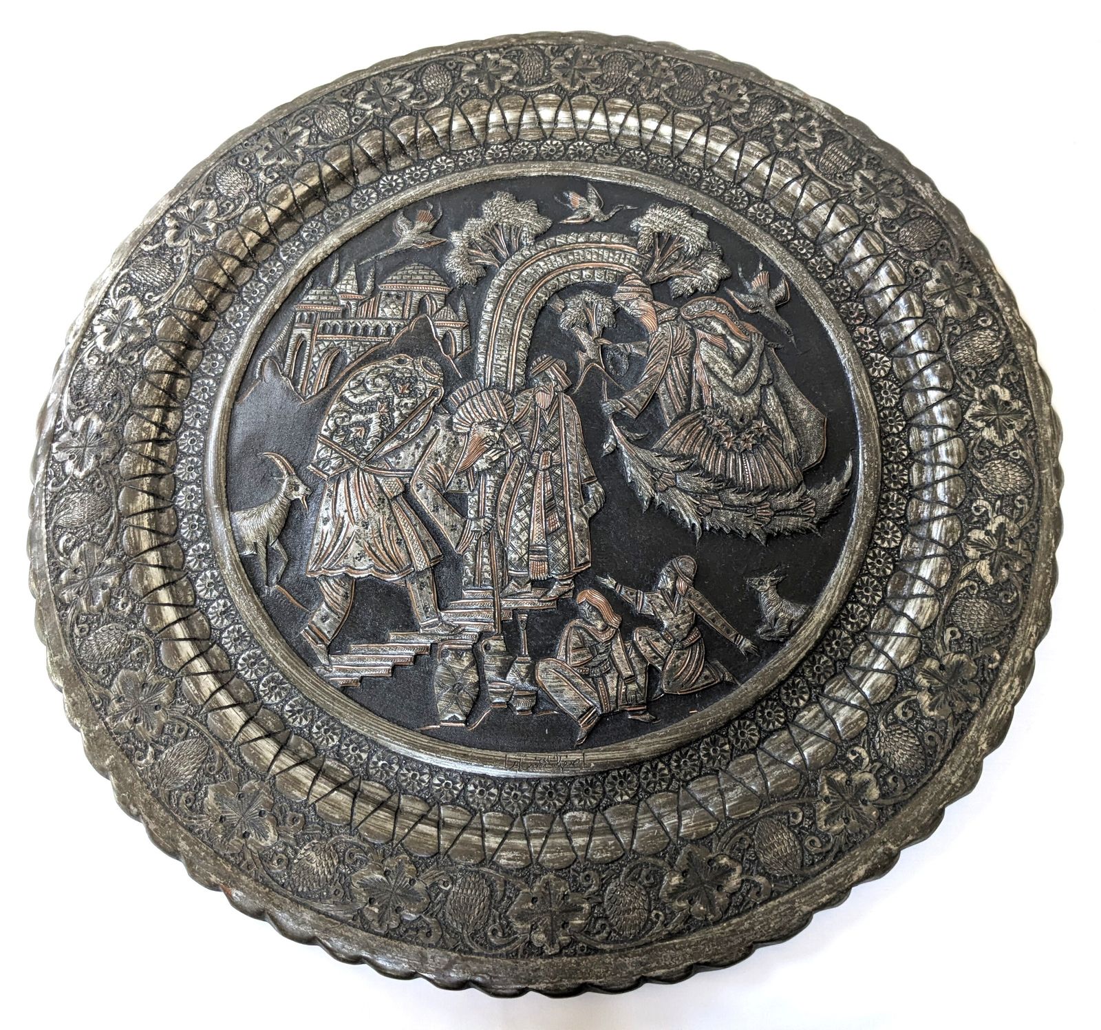 photo furniture Antique Islamic Qajar Tinned Brass Charger With Intricate Hammered And Etched Scenery