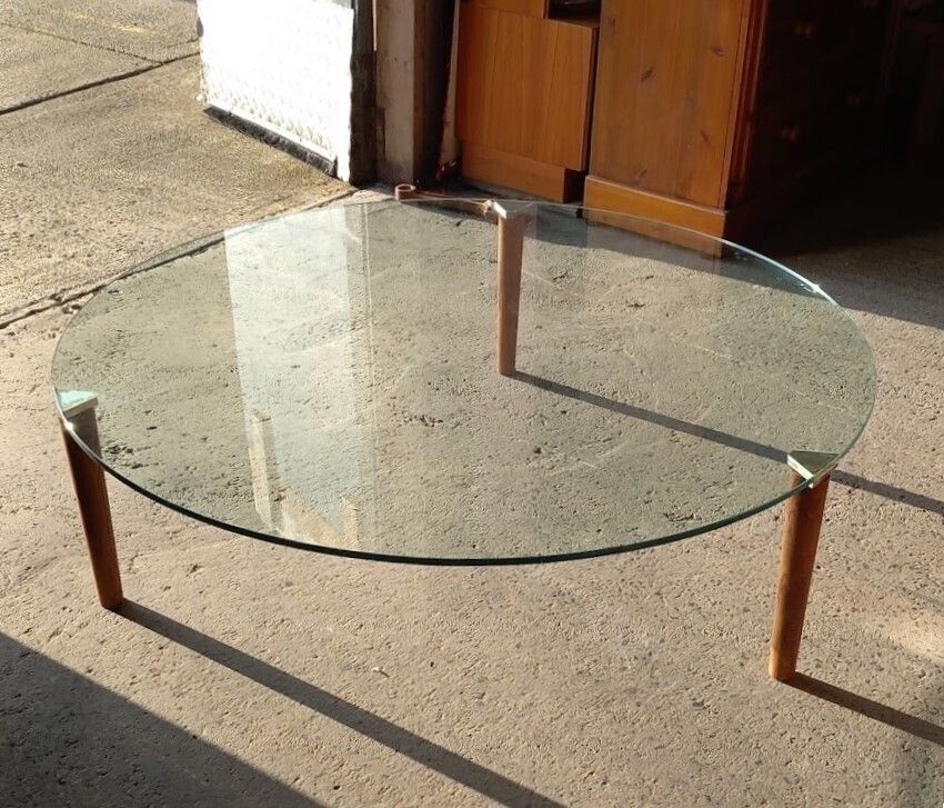 Glass Topped Minimalist Style Coffee Table With Teak Legs photo furniture