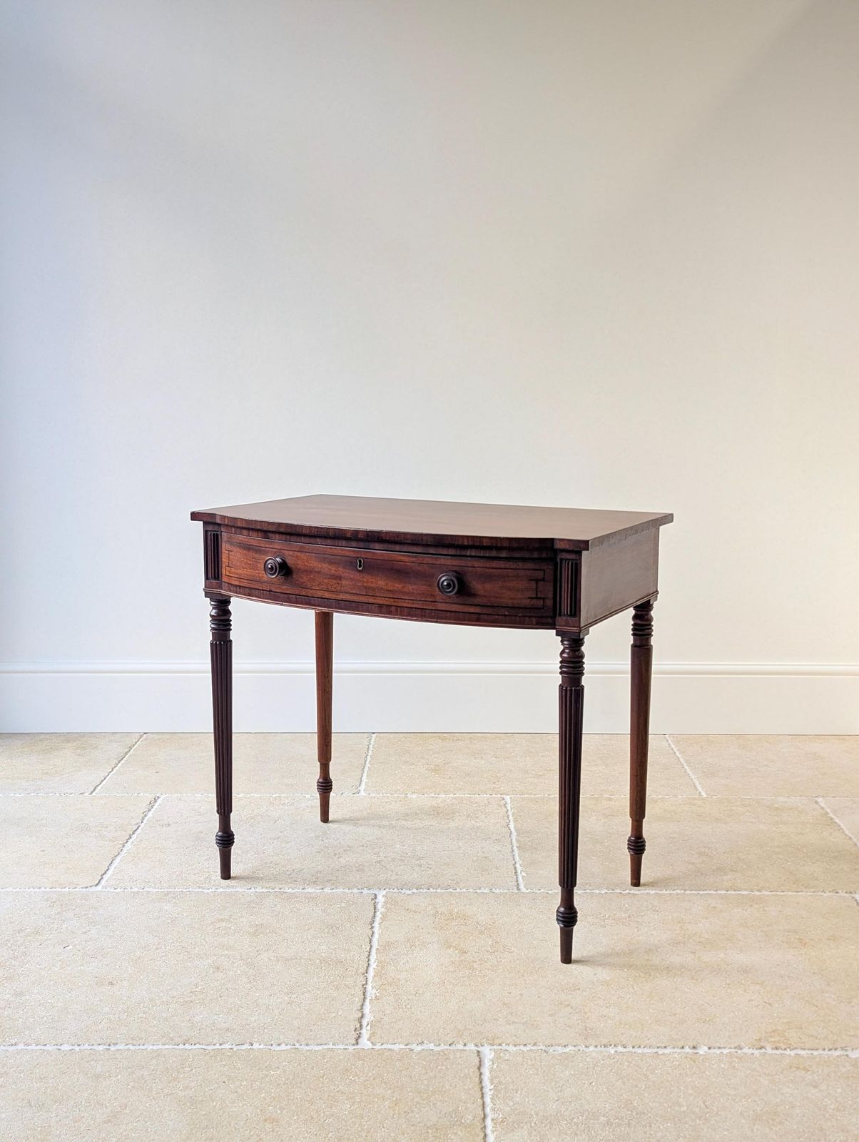 photo furniture Antique Early 19th Century Mahogany Bow Front Writing Table