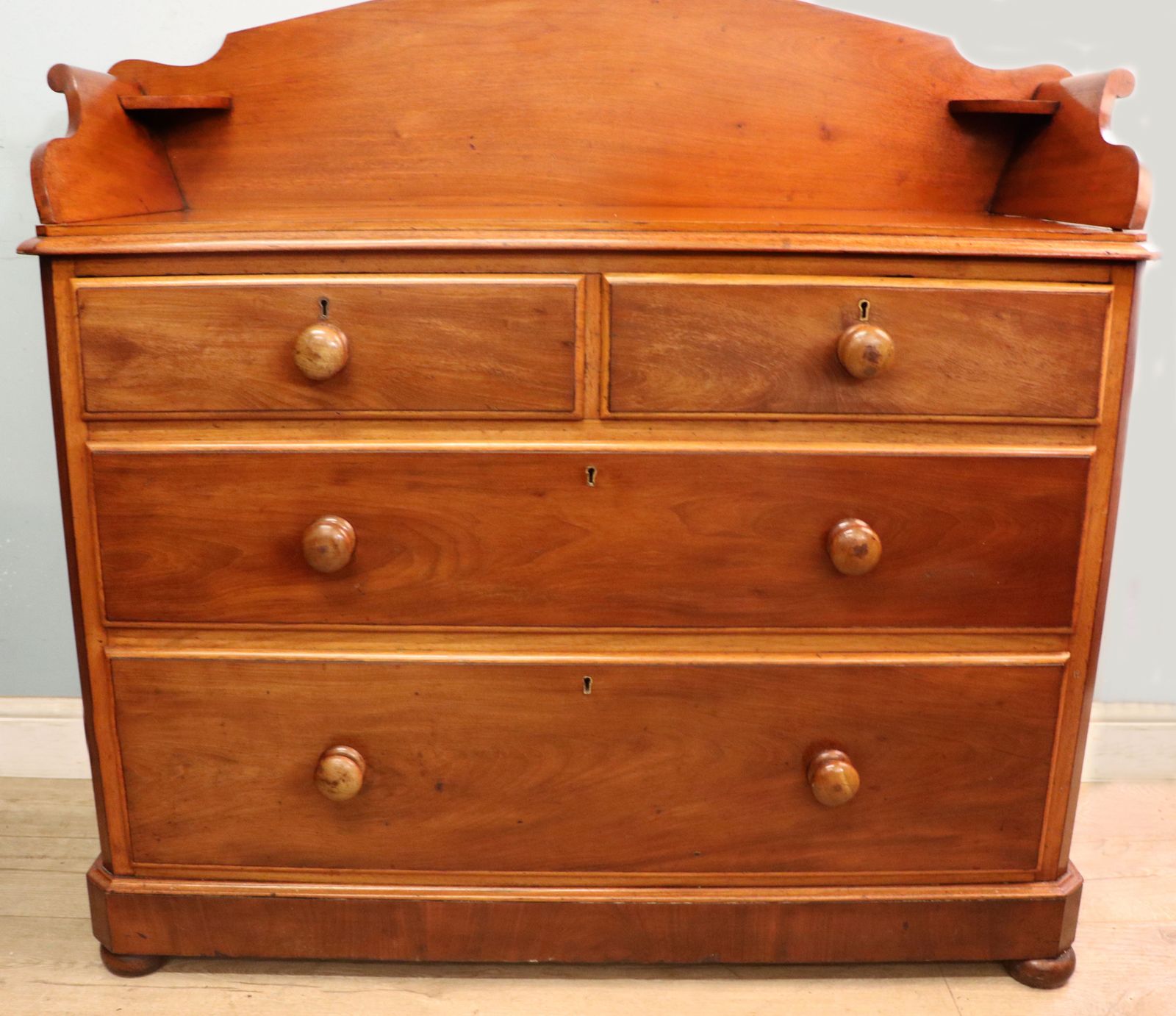 A Lovely Mid 19th Century Mahogany Galleried Back Chest Of Drawers. photo Furniture