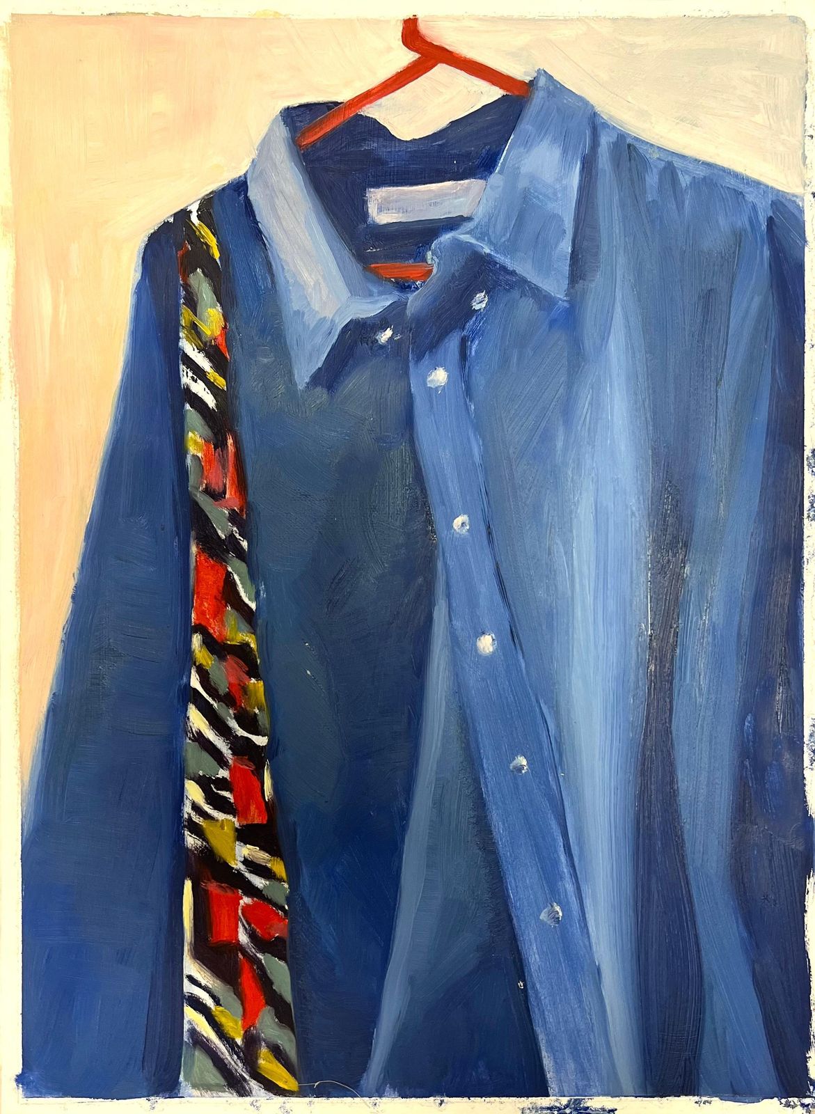 Jill Jacksonblue Denim Shirt Hanging On A Red Hanger With A Boldly Patterned Scarf photo furniture