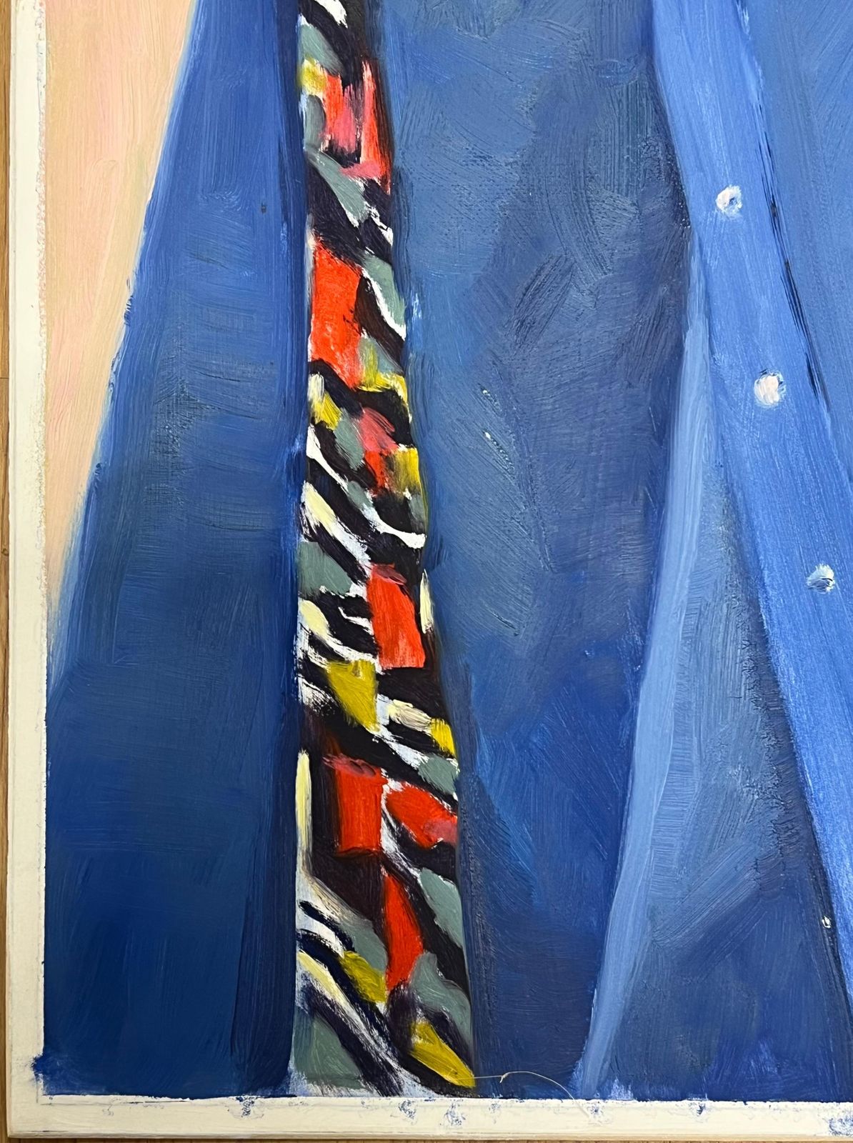 Jill Jacksonblue Denim Shirt Hanging On A Red Hanger With A Boldly Patterned Scarf photo 505.0