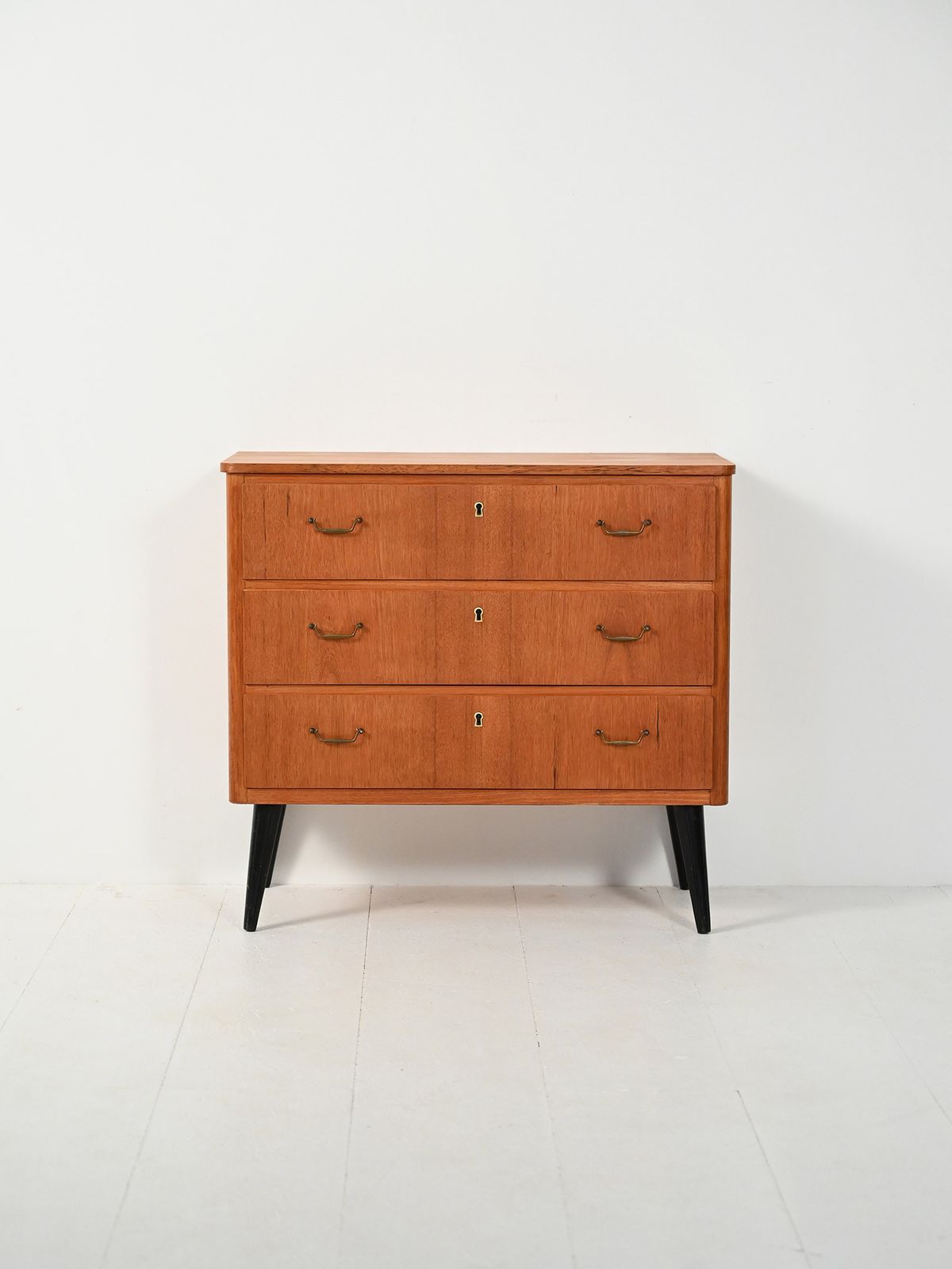 Scandinavian Teak Chest Of Drawers With Black Legs photo furniture