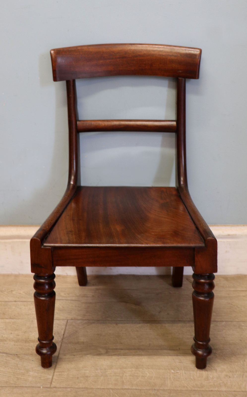 An Early Victorian Child’s Mahogany Bar Back Chair.