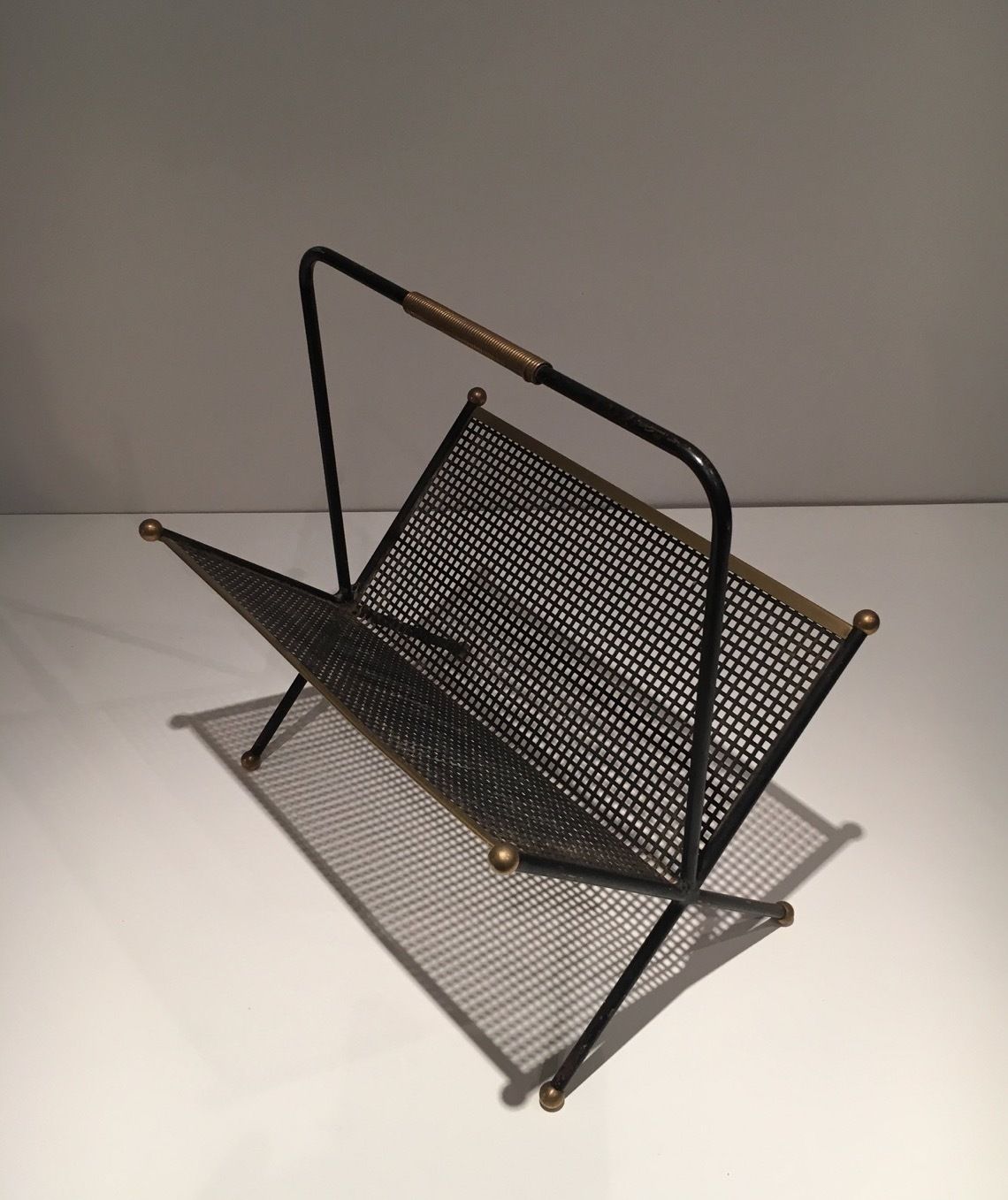 Design Magazine Rack In Black Lacquered Metal, Perforated Sheet Metal And Brass photo for sale