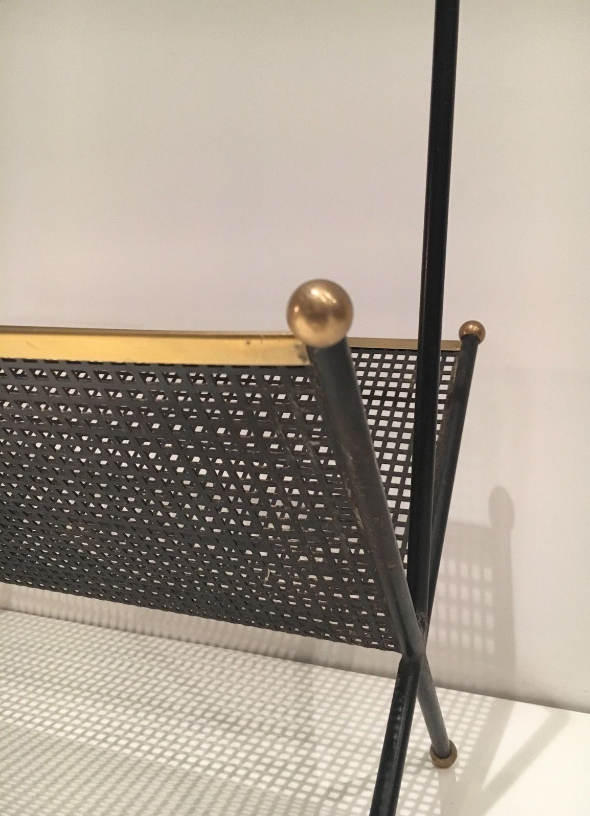 Design Magazine Rack In Black Lacquered Metal, Perforated Sheet Metal And Brass photo vinterior