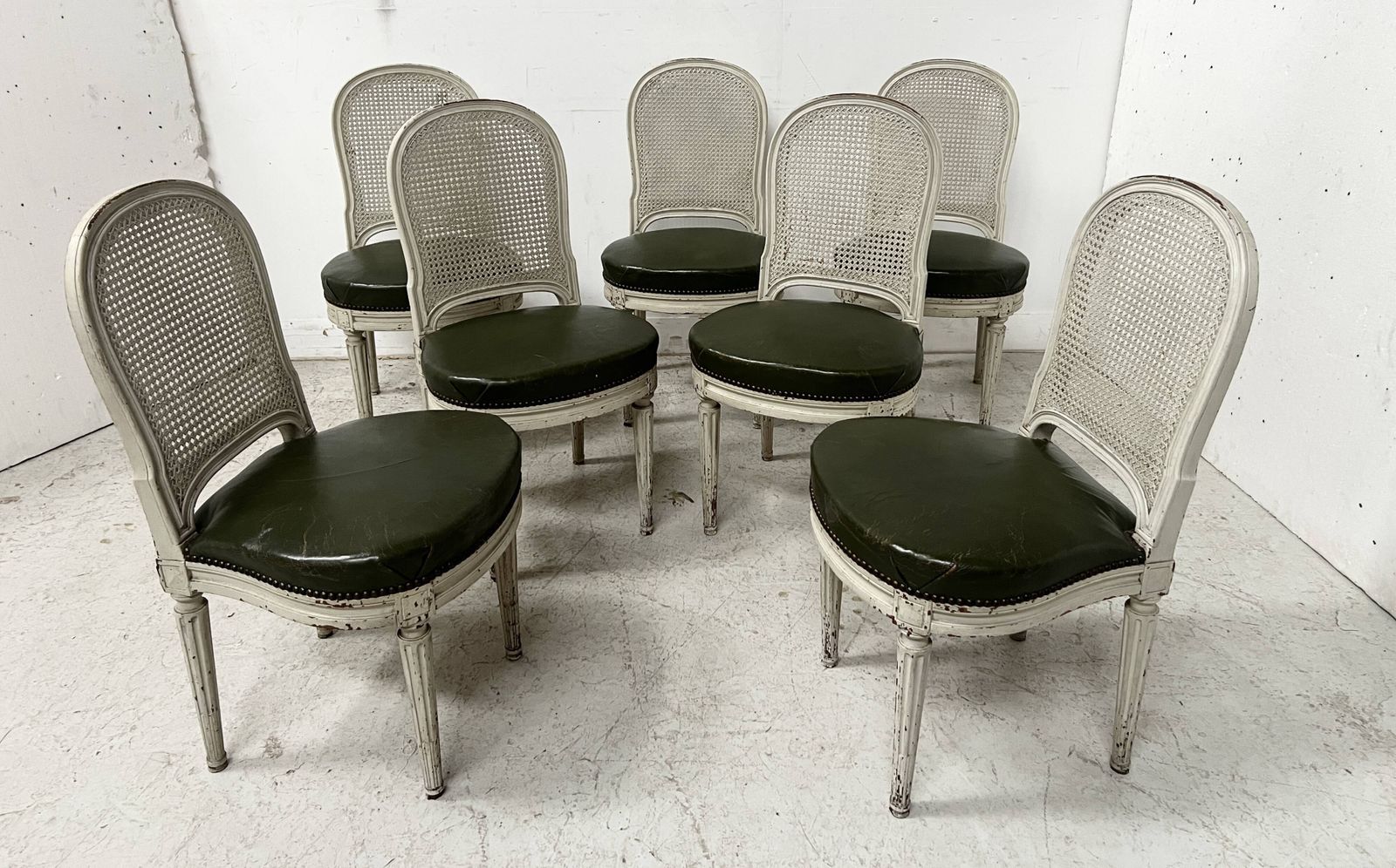 photo buy Set Of Seven Louis XVI Style Chairs In Patinated Beech, 20th Century.