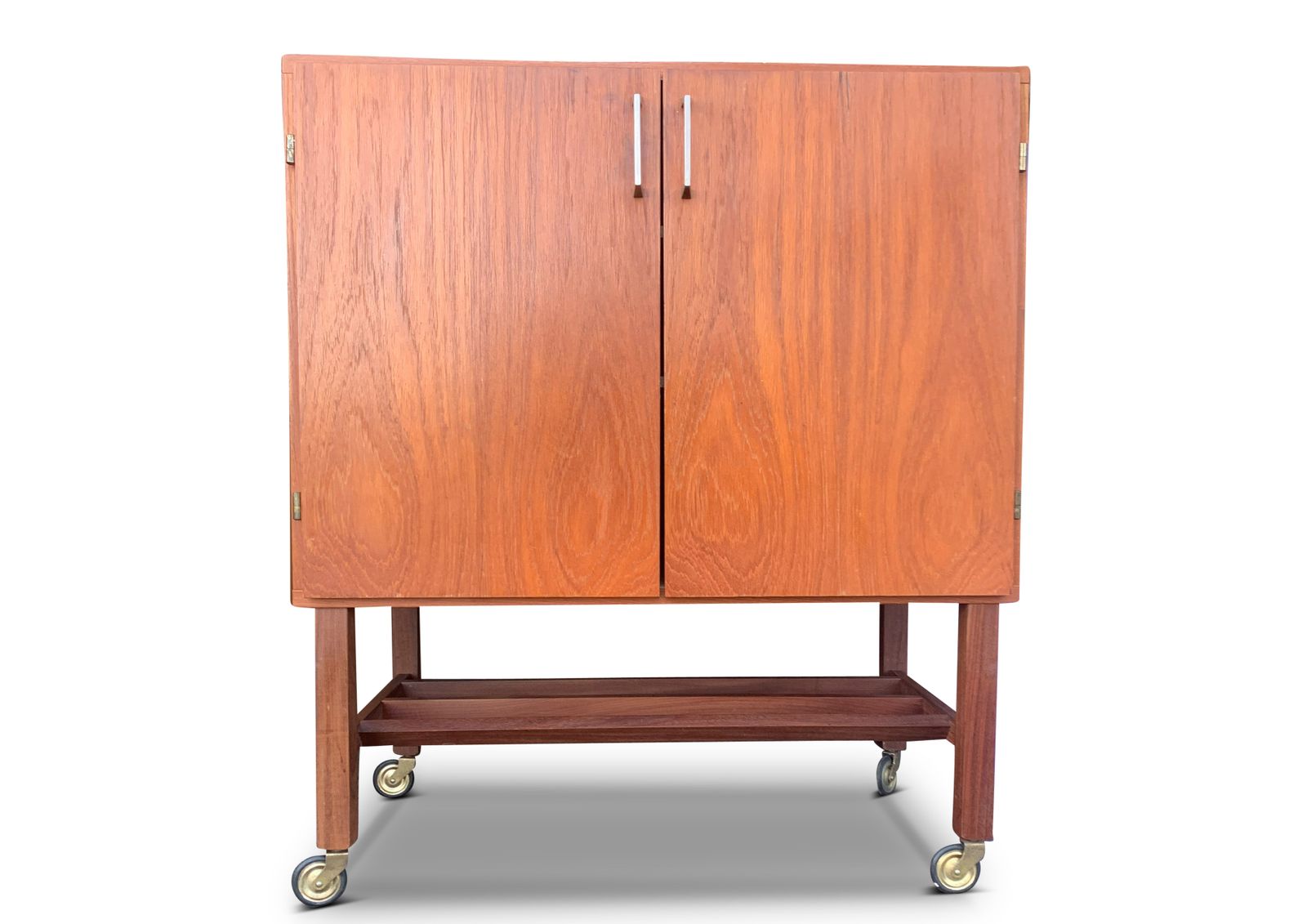 Mid Century Modern Teak Vinyl Cabinet, With Fitted Interior, Raised On Square Supports With Castors Ol