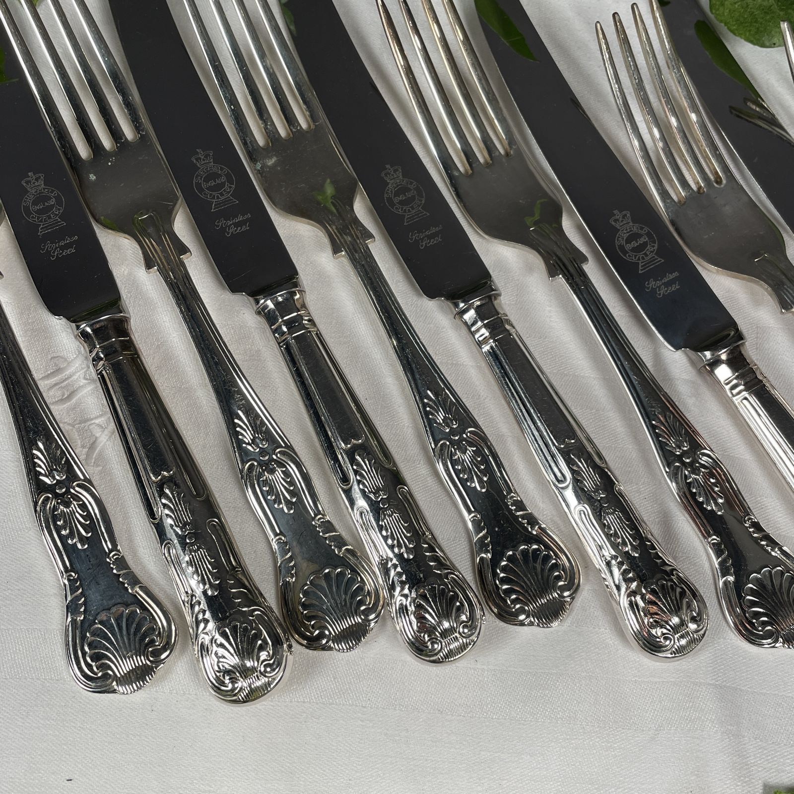 A Set Of Silver Plated Knives And Forks photo for sale