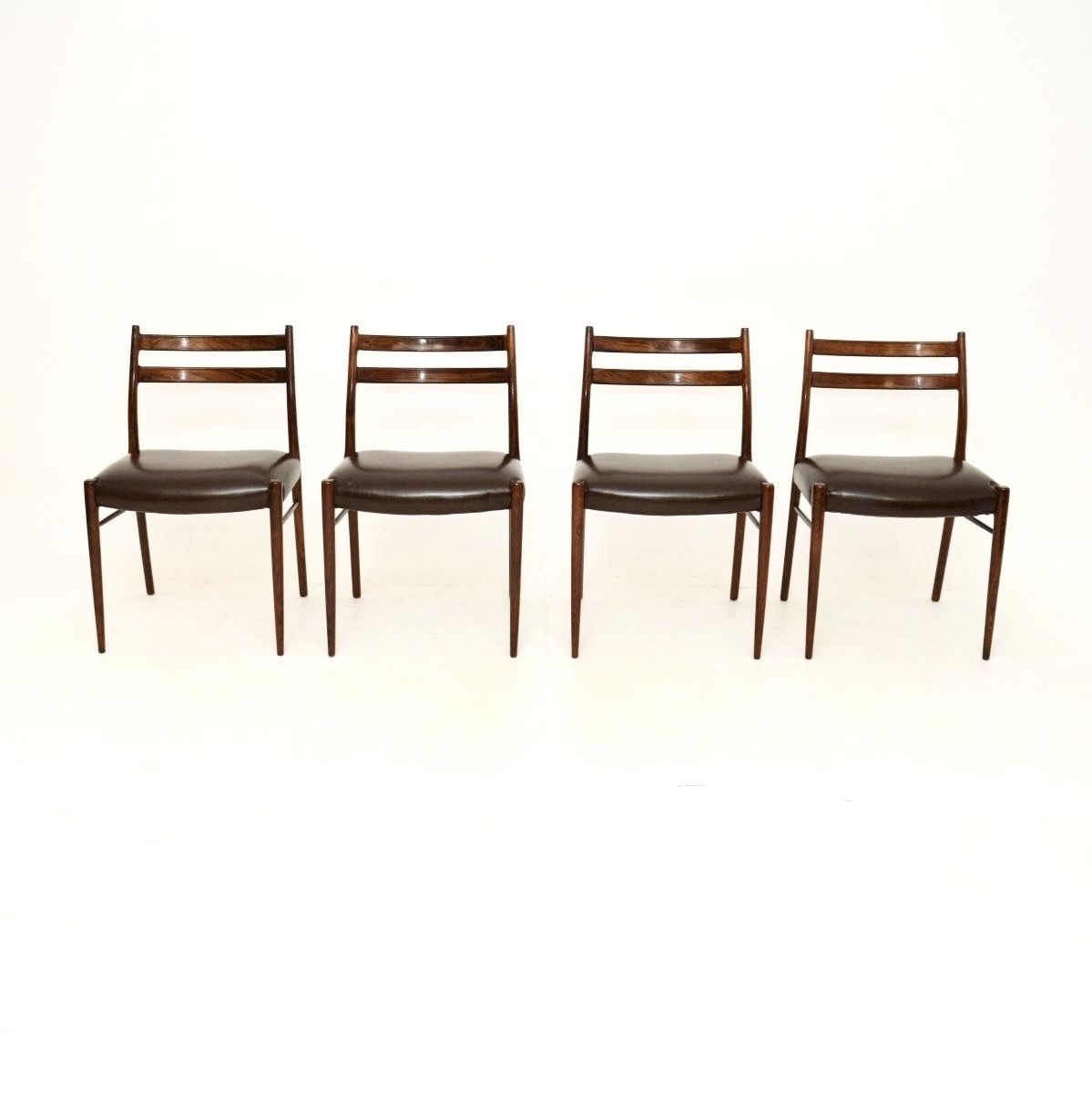 Set Of Four Danish Rosewood And Leather Dining Chairs By Arne Wahl Iversen photo furniture