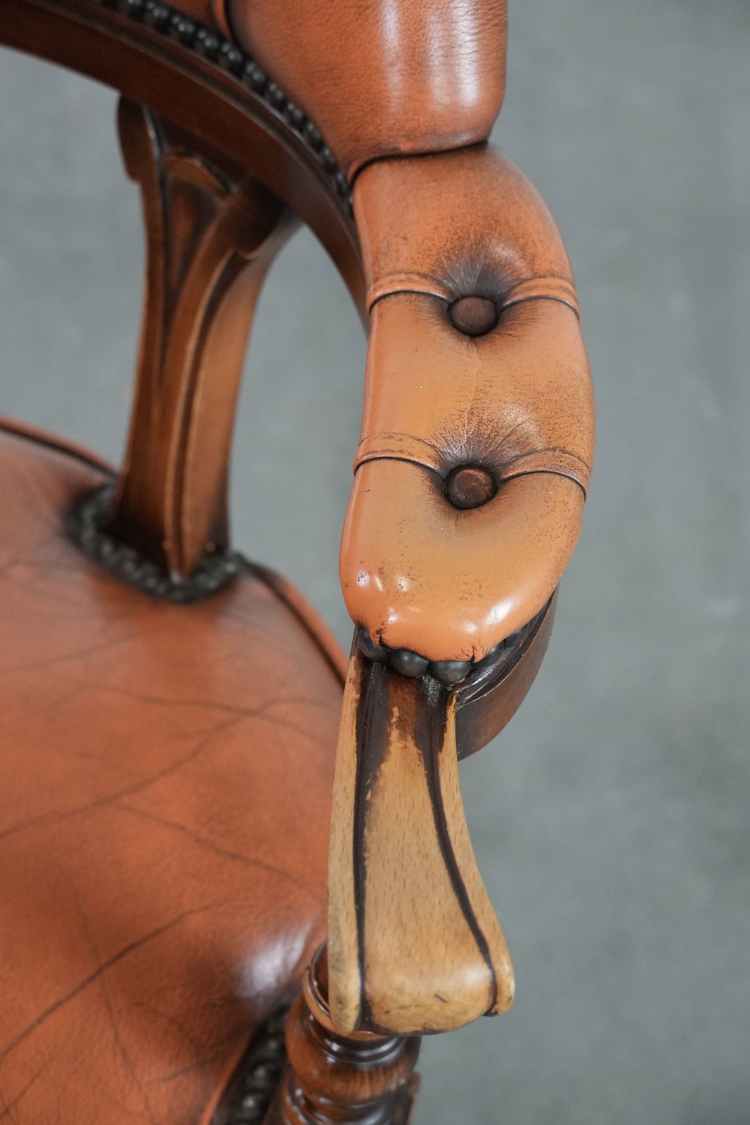 Classic And Timeless Cowhide And Wooden Chesterfield Office Chair Finished With Decorative Nails In English Style photo vintage