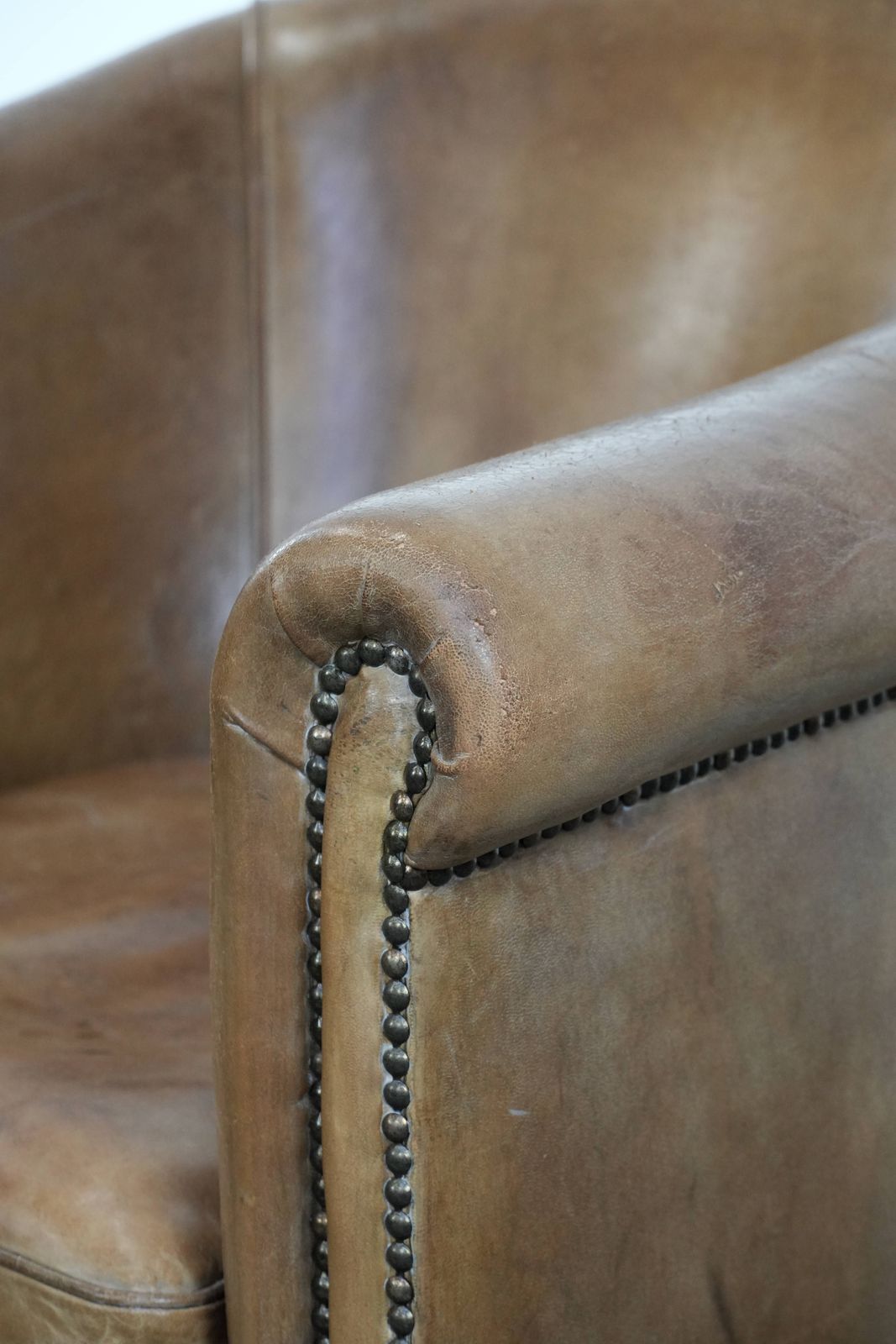948.0 Characterful Club Armchair Made Of Sheepskin With Beautiful Light Cognac Colors photo