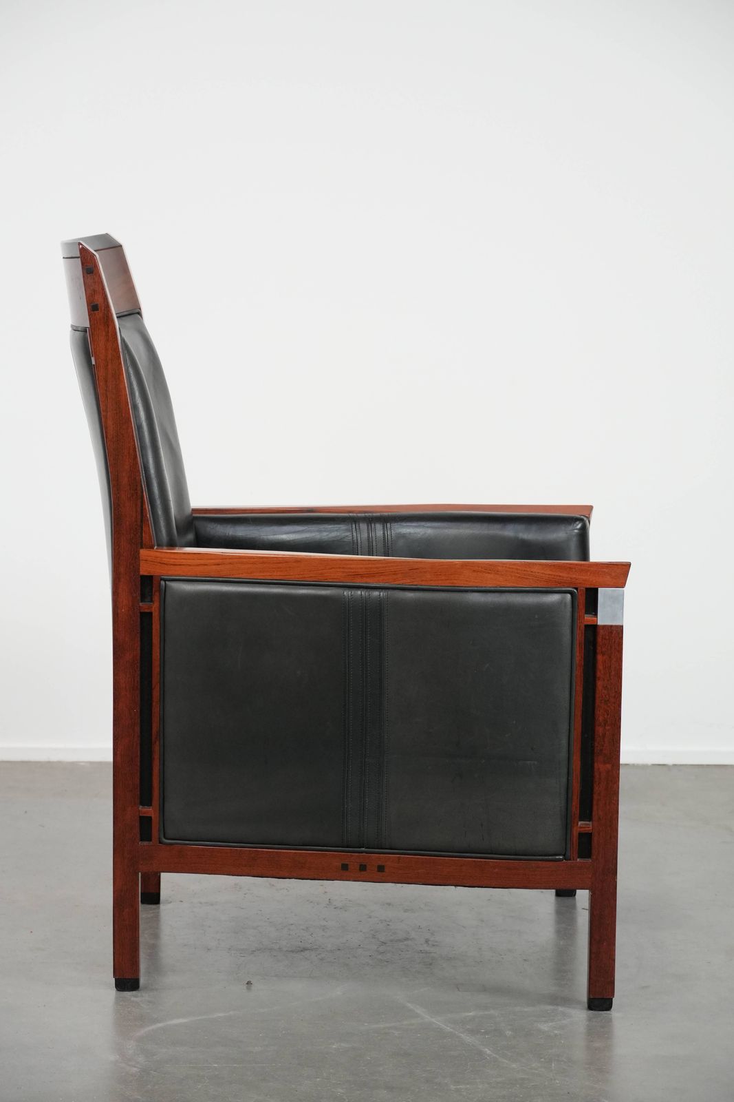 Black Cowhide And Wooden Art Deco Design Armchair With Decorative Padding photo for sale