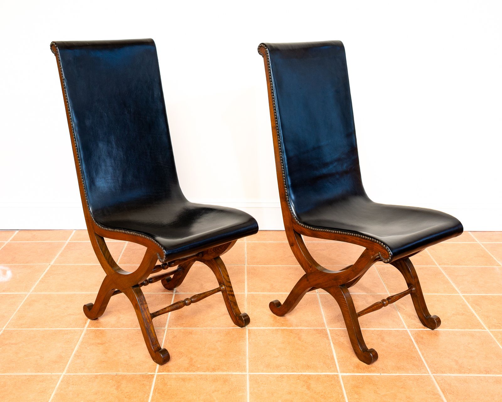 Furniture Pair Of Spanish Oak Leather Dining Chairs By Pierre Lottier Valmazan Mid Century Neoclassical Colonial 1960s Black Leather Sling Seat Studded Leather photo