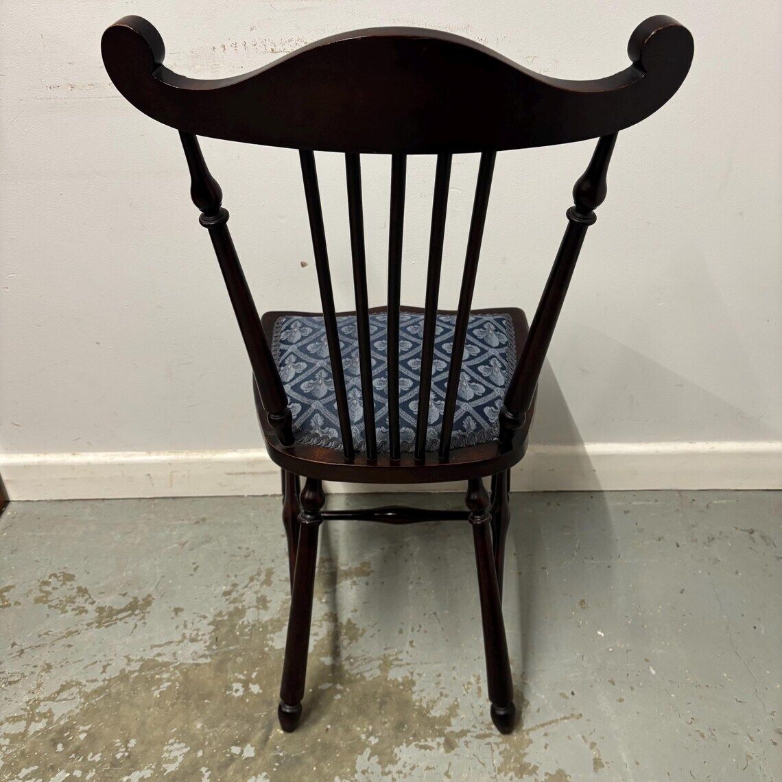 photo vintage Vintage Wooden Stick Back Chair With Upholstered Seat And Back