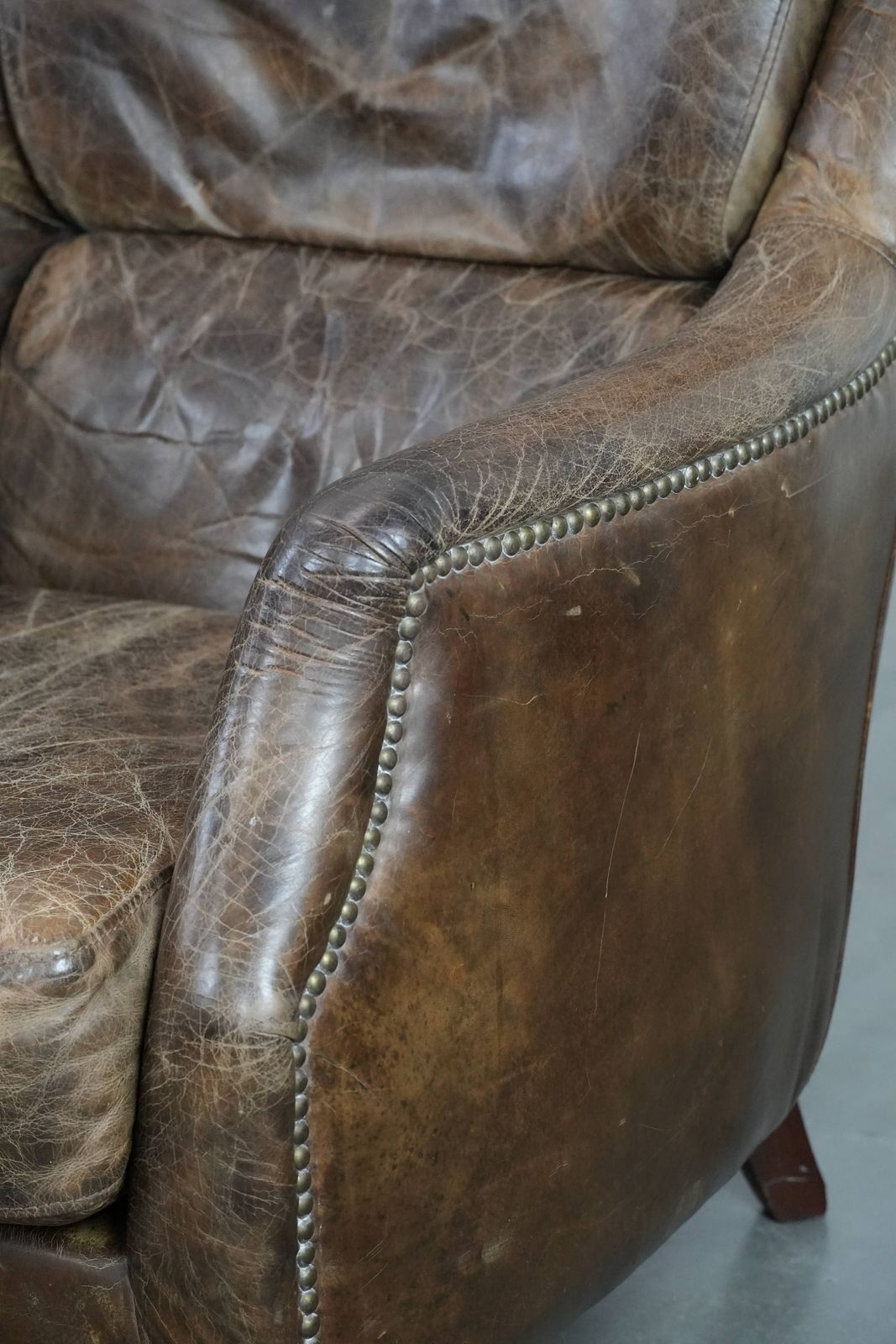 photo buy Characterful And Very Comfortable Set Of Two Vintage Cowhide Armchairs With Beautiful And Striking Colours