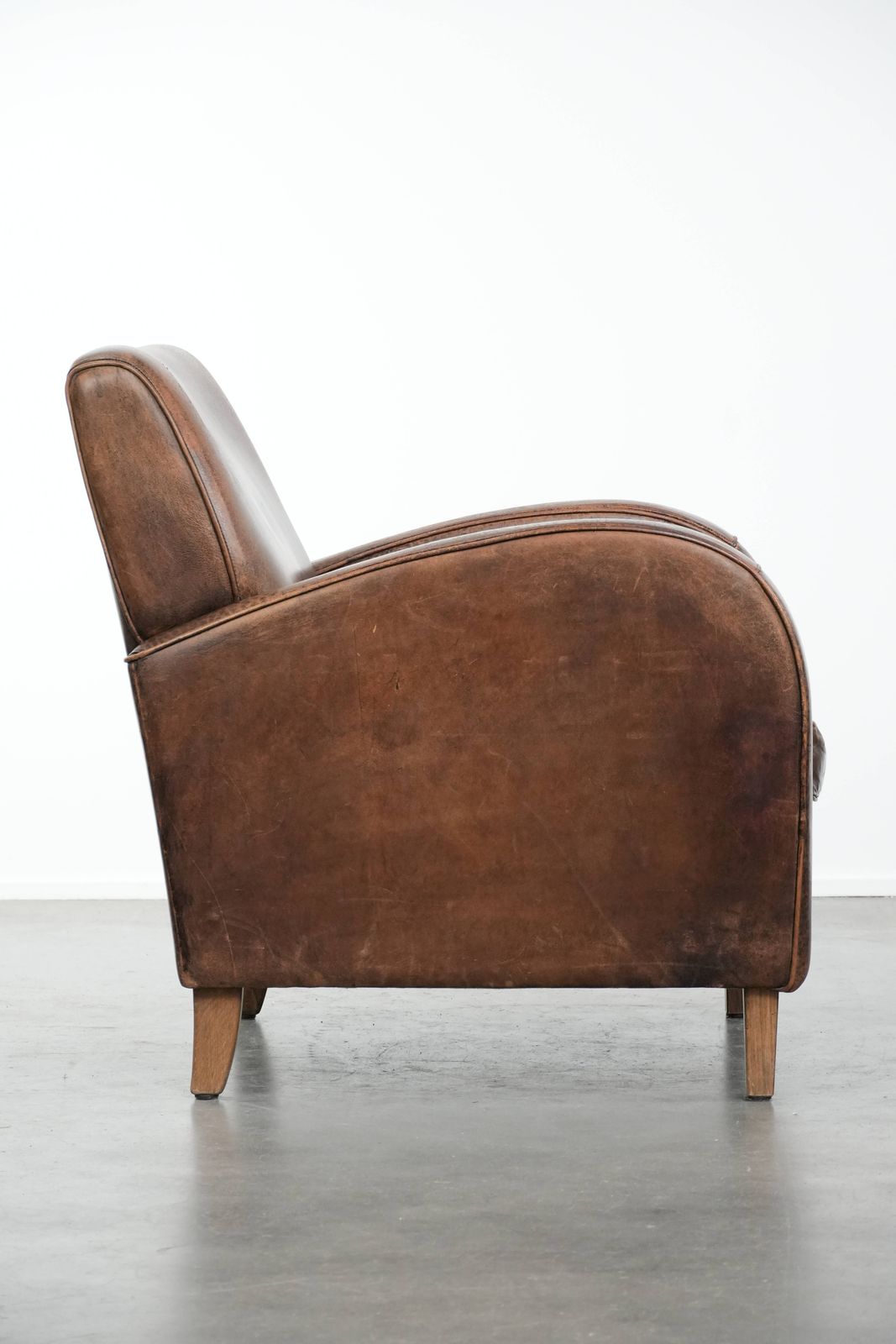 Sturdy And Timeless Vintage Sheepskin Armchair With A Round Design And Comfortable Seat photo for sale