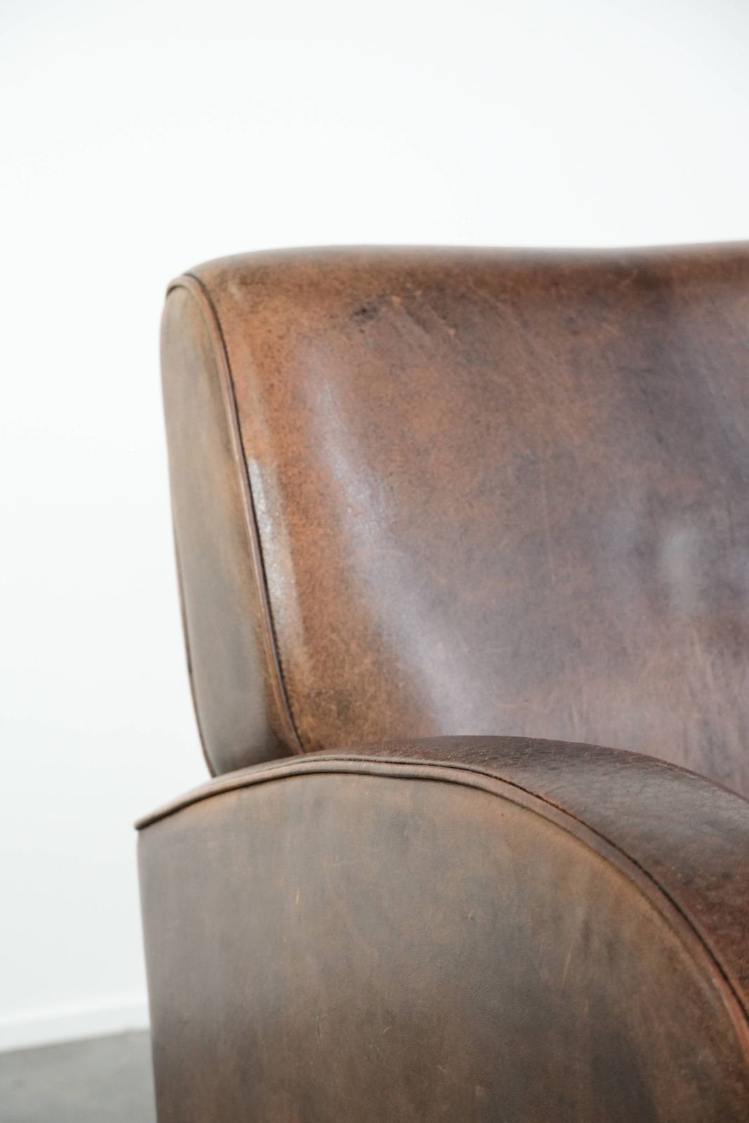 photo for sale Sturdy And Timeless Vintage Sheepskin Armchair With A Round Design And Comfortable Seat