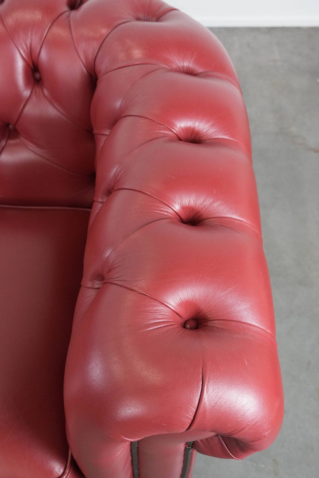 photo furniture Wonderful Set Consisting Of An English Cowhide Chesterfield 2.5 Seater Sofa And Matching Armchair In A Stunning Red Colour