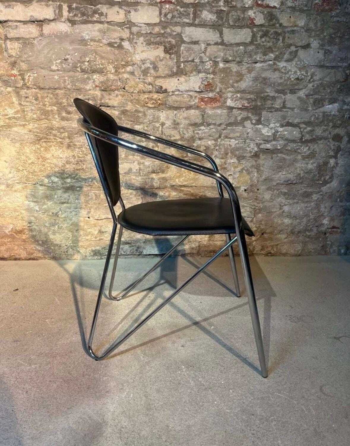 Effezeta Chairs With Black Leather Upholstery And A Chrome / Tubular Steel Frame photo for sale