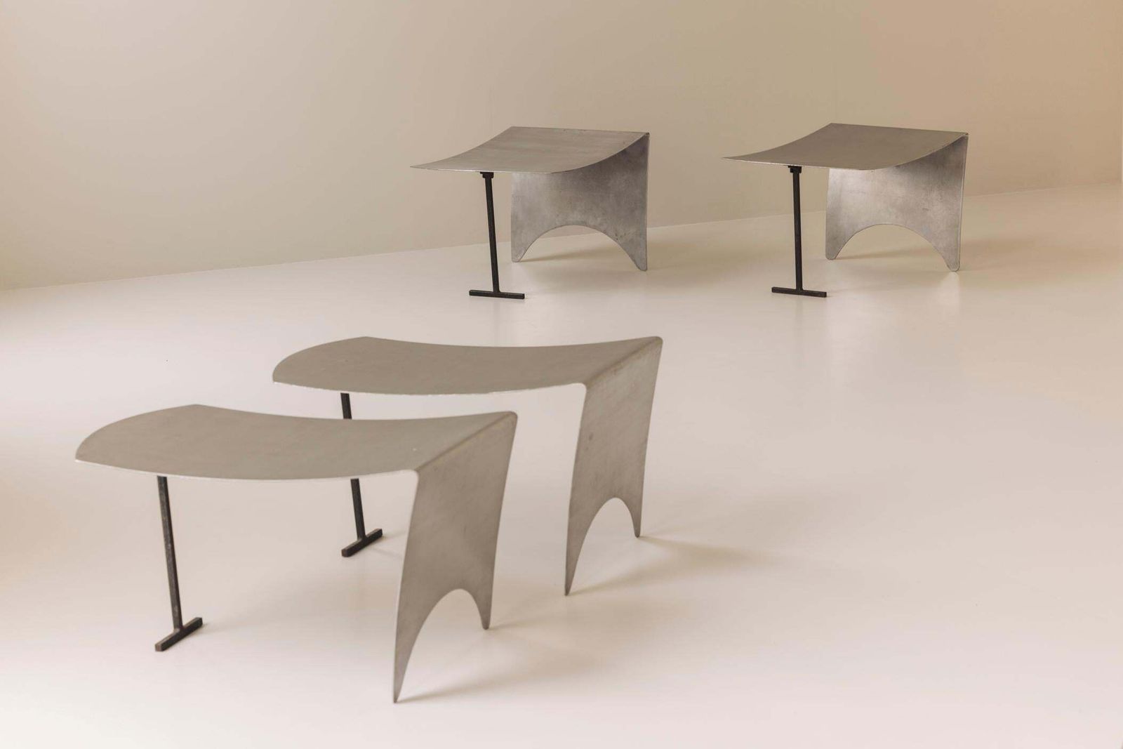 photo for sale A Striking Set Modernist Curved Metal Stools From France, Dating To The 1980s.