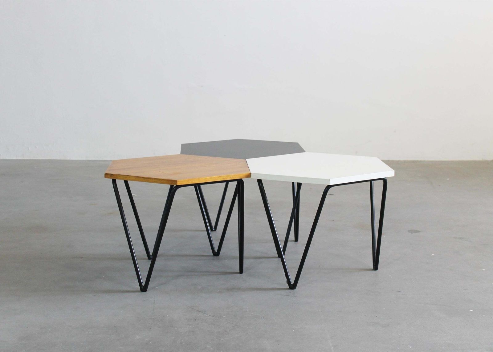 photo furniture Gio Ponti Set Of Three Hexagonal Coffee Tables In Wood And Metal I.S.A. 1950s
