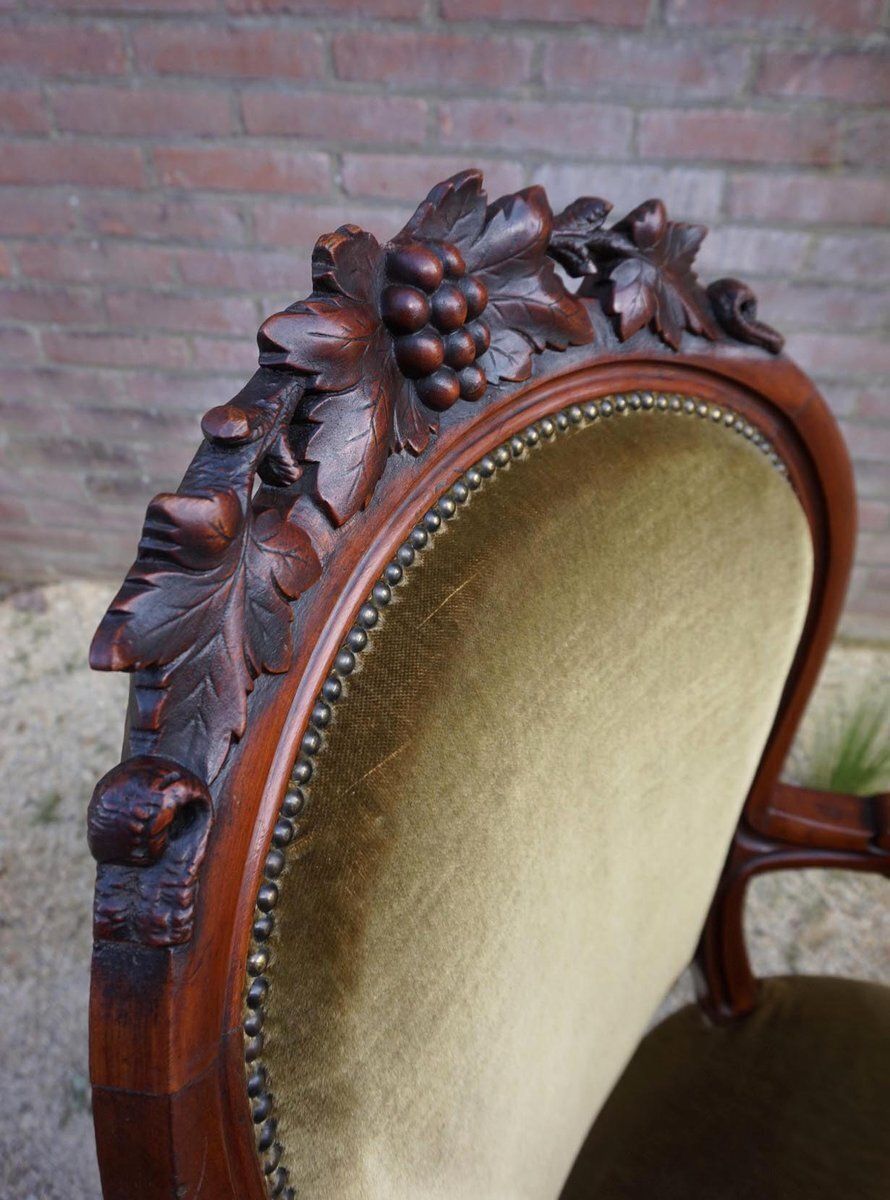 Biedermeier Mahogany Armchair With Carved Grapes And Leaves Decoration On Top, 1870s photo vintage