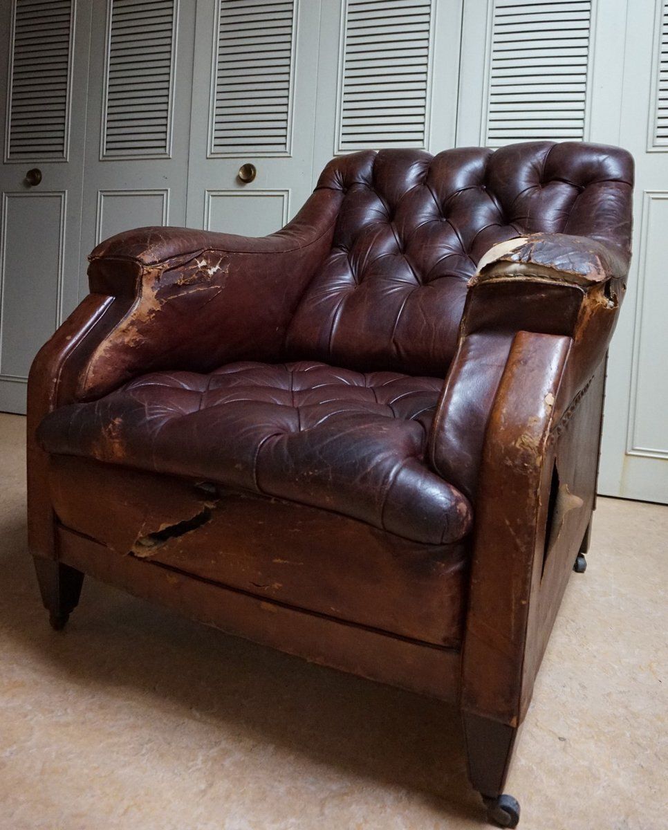1518.0 19th Century Distressed Leather Chesterfield Library Armchair photo
