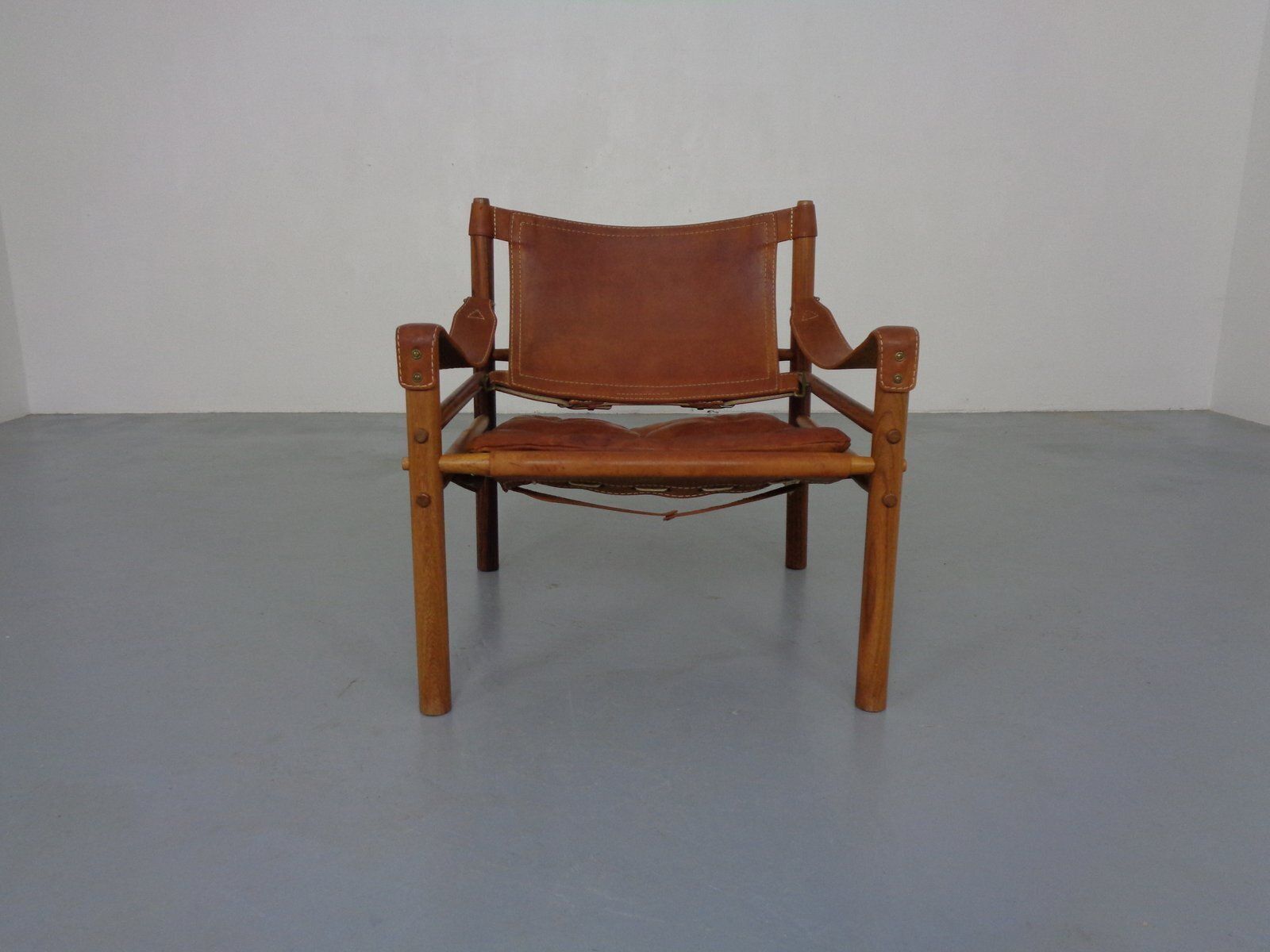 Furniture Sirocco Safari Chair In Rosewood And Leather By Arne Norell, Sweden, 1960s photo