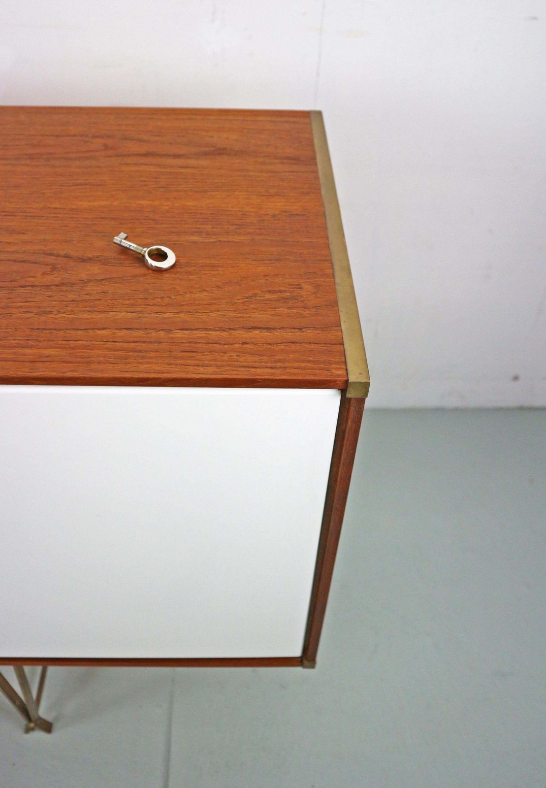 photo furniture William Watting Teak & Brass Highbiard/ Buffet Cabinet For Fristho, 1950 Denmark