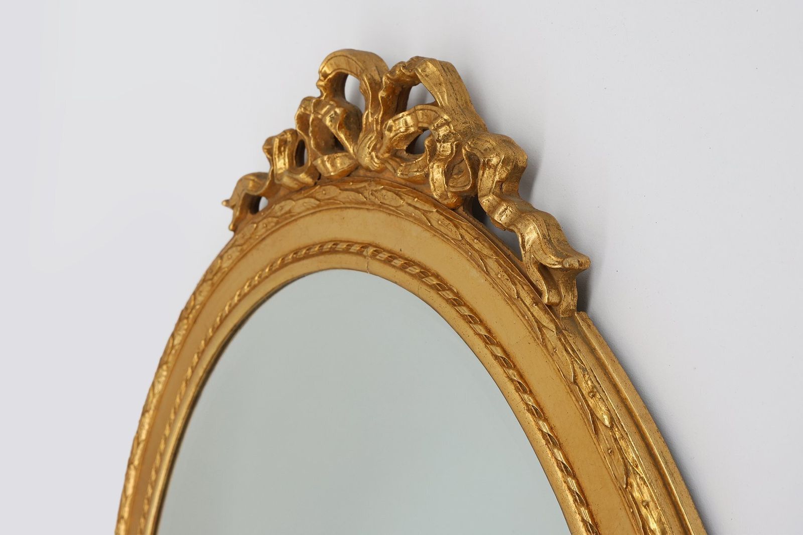 Oval Shaped Carved Gilded Baroque Mirror With Beveled Glass, 1960s photo vintage