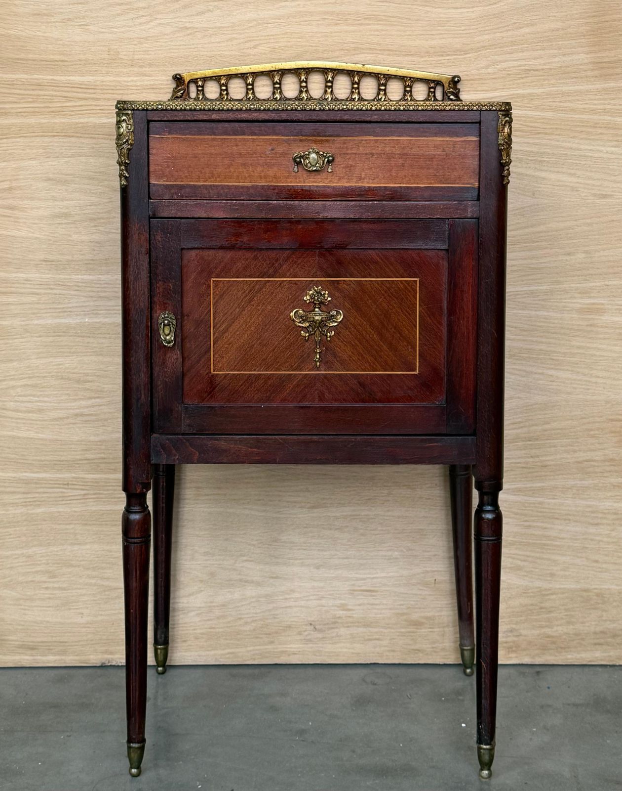 Pair Of French Mahogany Nightstands With Drawer, Door And Bronze Crest photo furniture