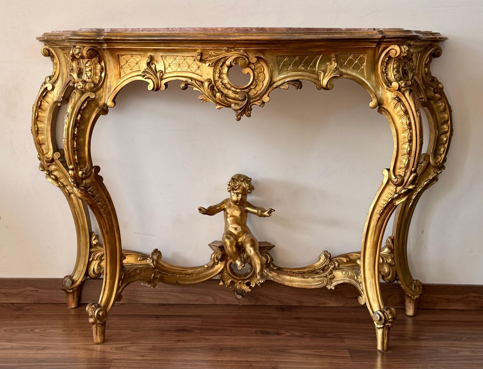 Console baroque en noyer doré et sculpté, avec ormolu et marbre, XIXe siècle, motif chérubin photo for sale