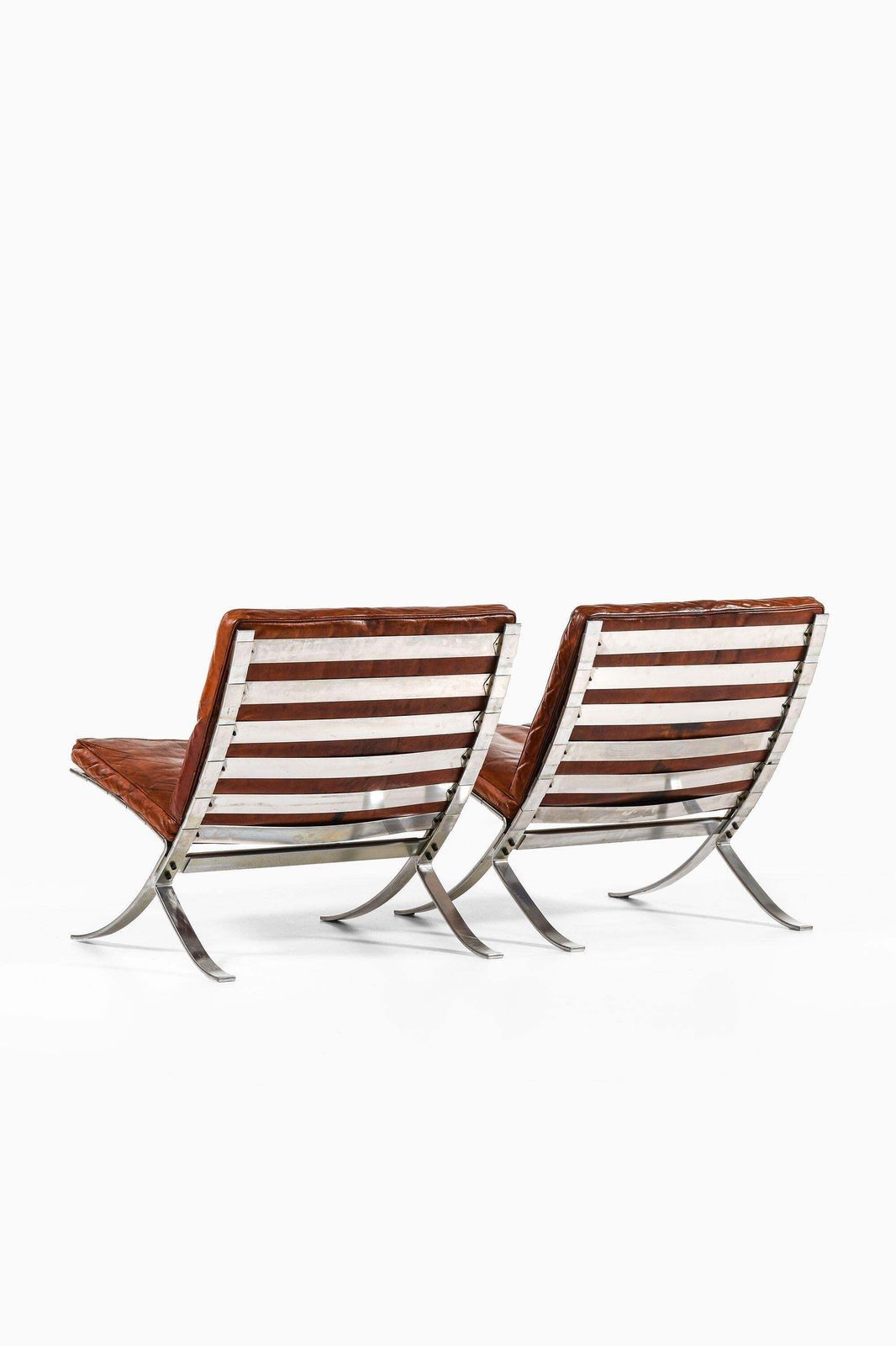 Pair Of Easy Chairs In Chromed Steel And Leather By Steen østergaard, 1960's photo 18957.0