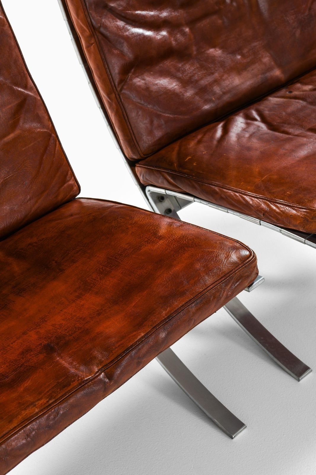 photo for sale Pair Of Easy Chairs In Chromed Steel And Leather By Steen østergaard, 1960's