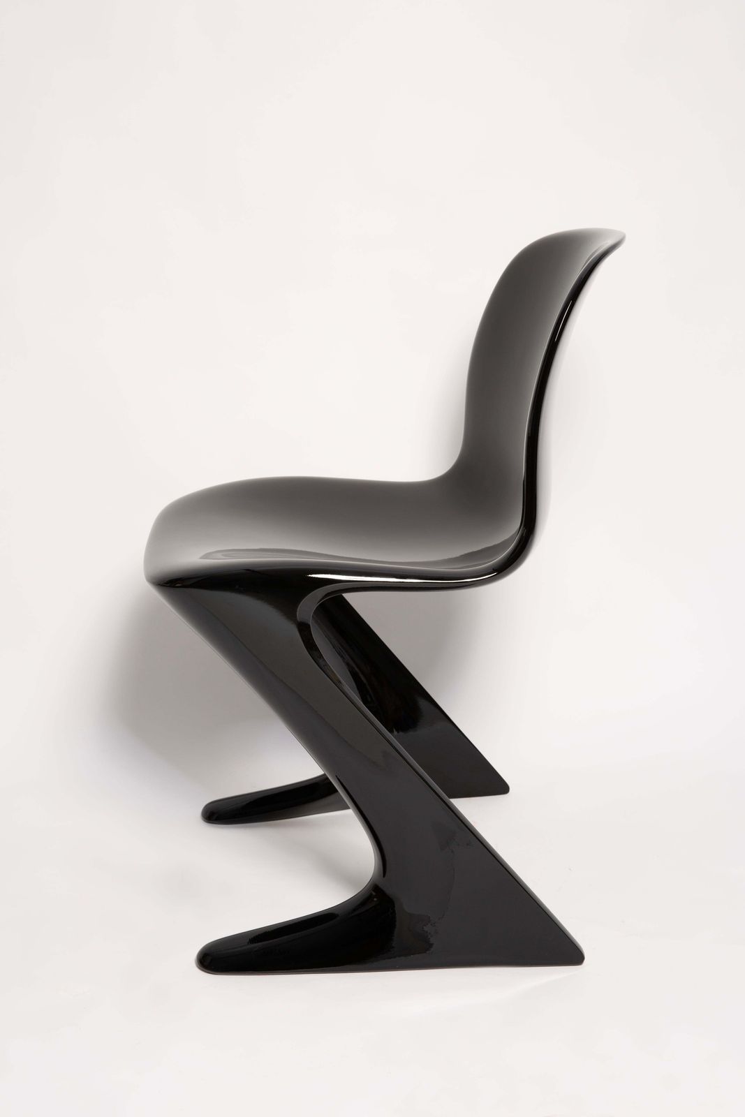 Eight Mid Century Black Kangaroo Chairs Designed By Ernst Moeckl, Germany, 1960s photo vinterior