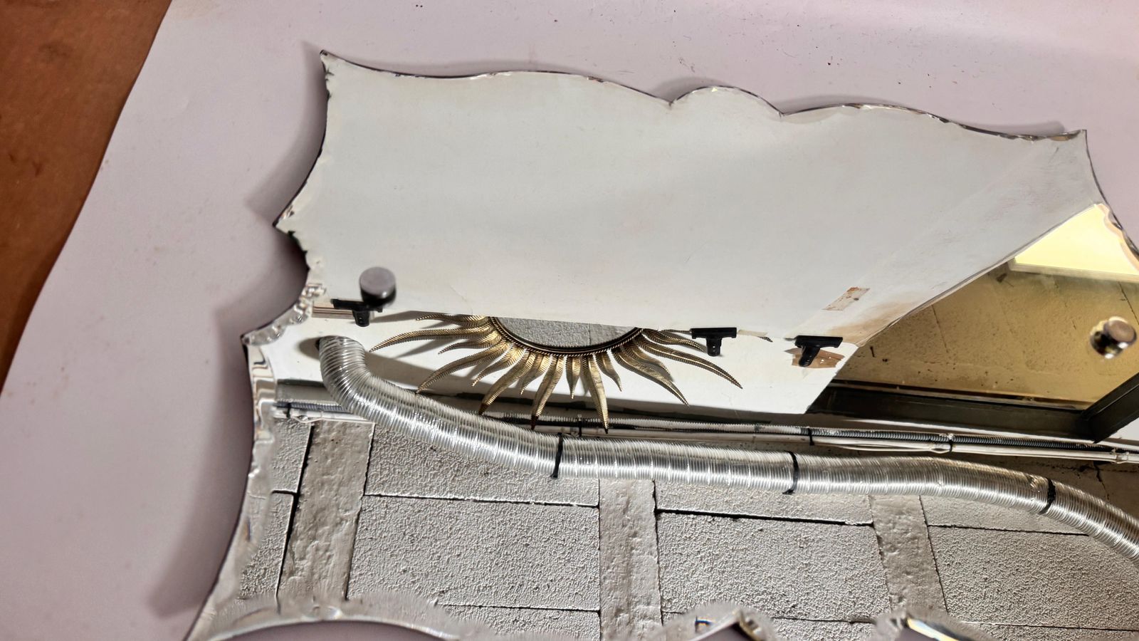 Art Deco Frameless Mirror With Sculpted Edges — France, 1940s photo vintage