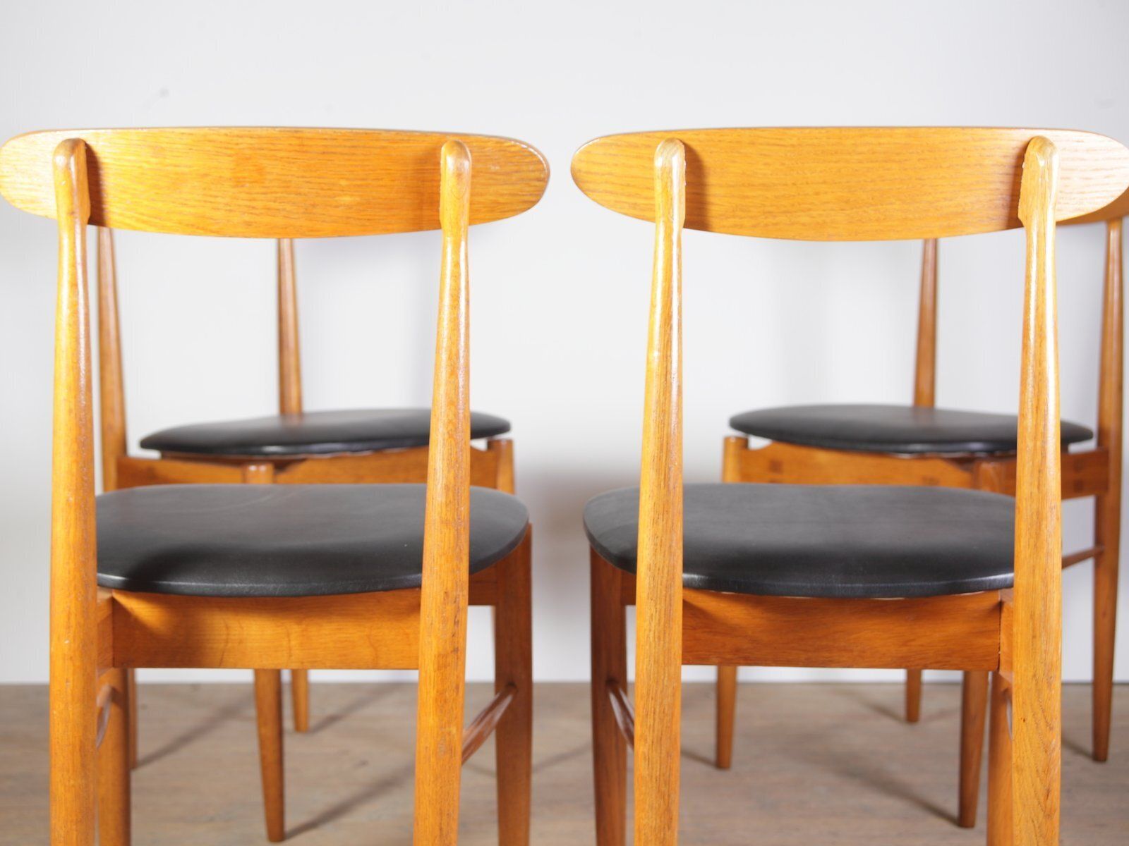 Mid Century Oak And Black Leather Dining Chairs From Uluv, Former Czechoslovakia, 1960s, Set Of 4 photo vintage