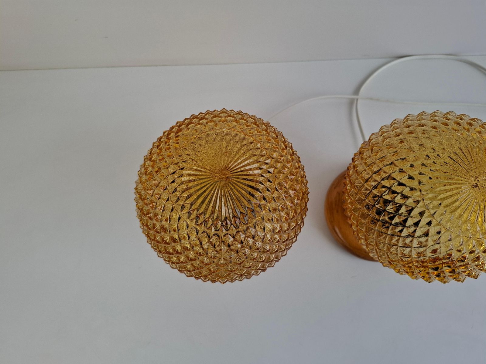 photo vintage Pair Of Mid Century Table Lamps With Amber Glass And Wood Base, Czechoslovakia