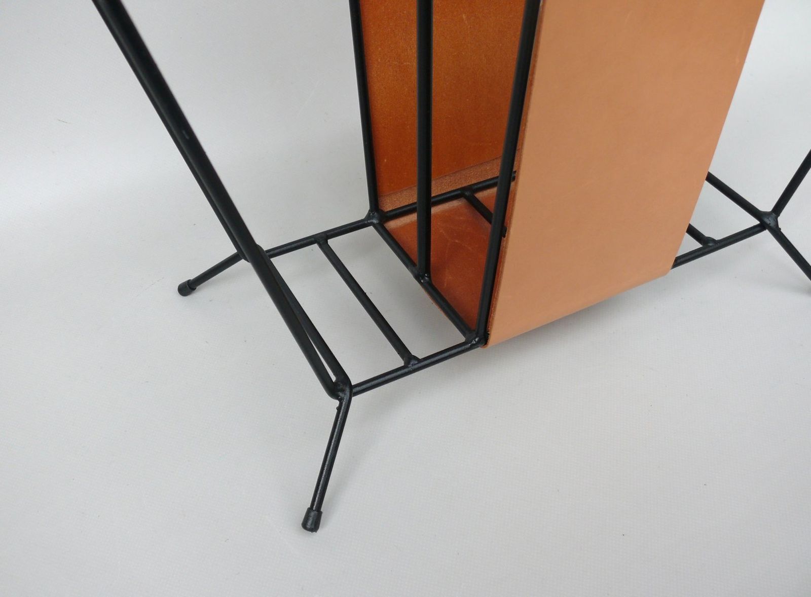 photo furniture Mid Century Magazine Rack In String Steel Painted Black & Light Leather In The Style Of Jacques Adnet, 1960s