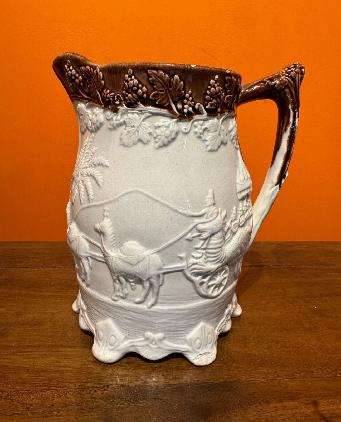 Victorian Yorkshire Pottery Jug Moulded With An Indian Carriage Scene