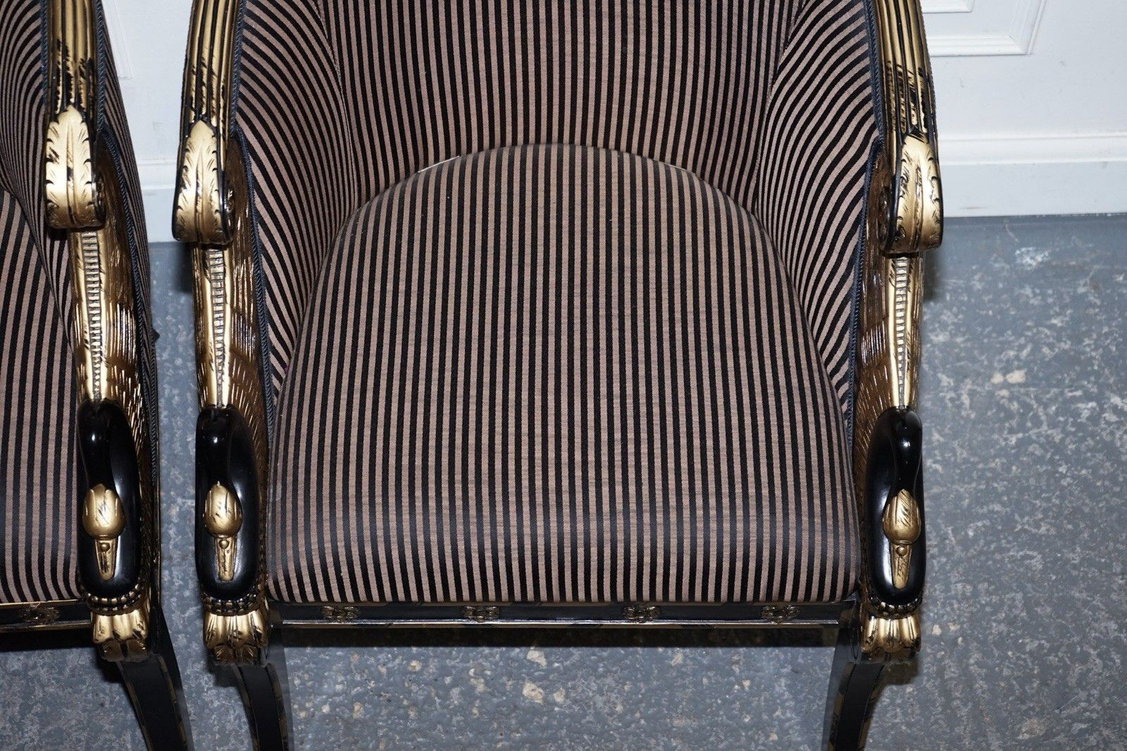 photo buy Lovely Pair Of Black Lacquered And Gilt Upholstered Open Armchairs