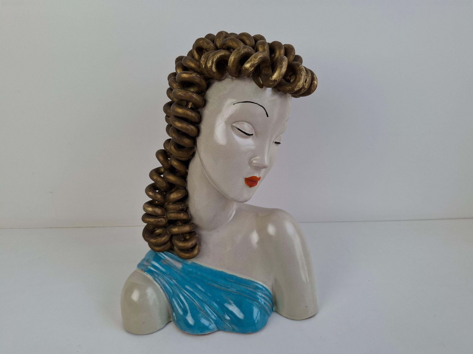 photo for sale 1930s Czechoslovak Art Deco Ceramic Bust Of A Woman With Gilded Curled Hair